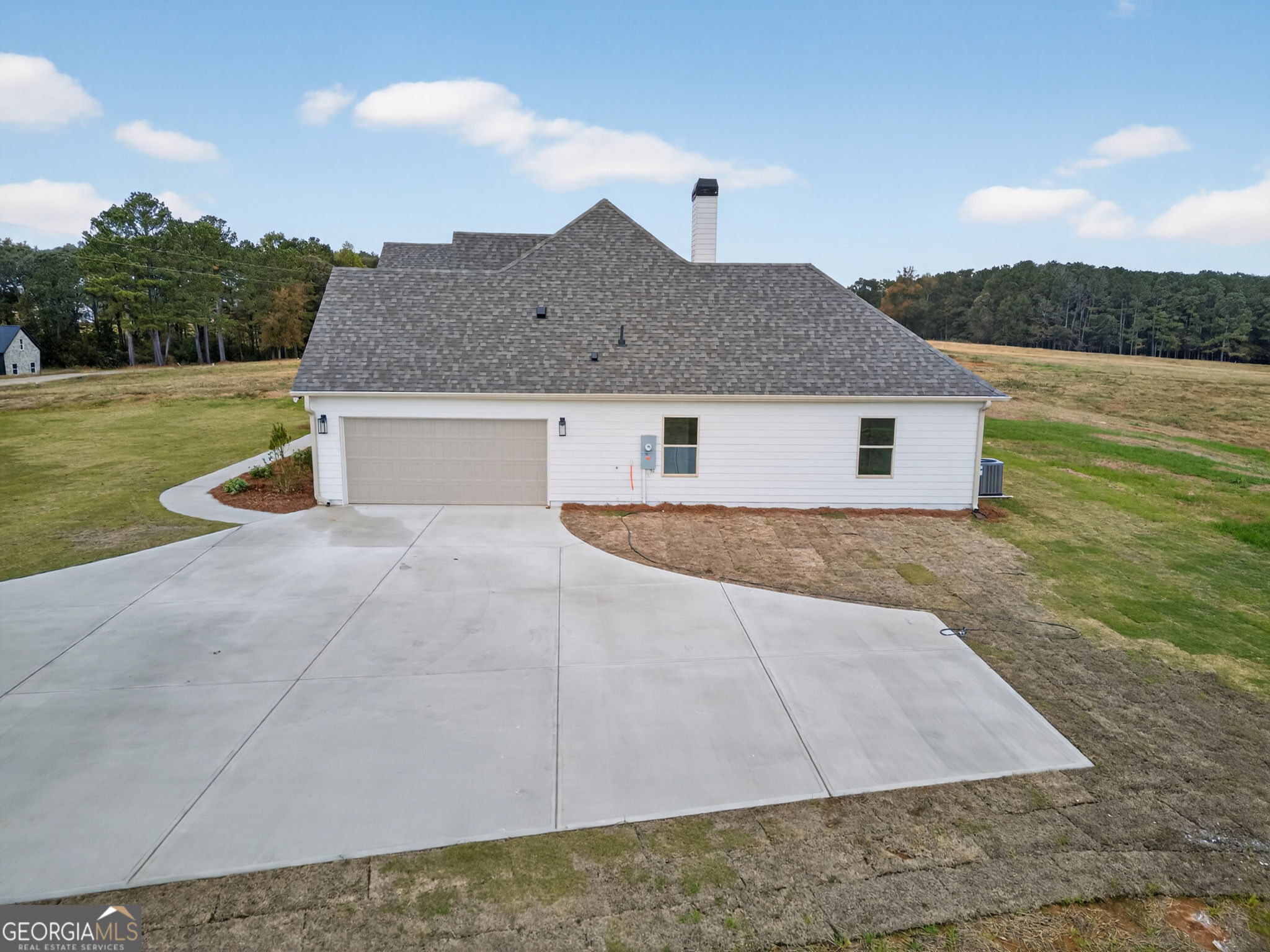 359 Gray Road Roopville, GA 30170 - Photo 46 of 46 a front view of a house with a yard and garage