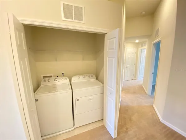 a view of utility room with washer and dryer