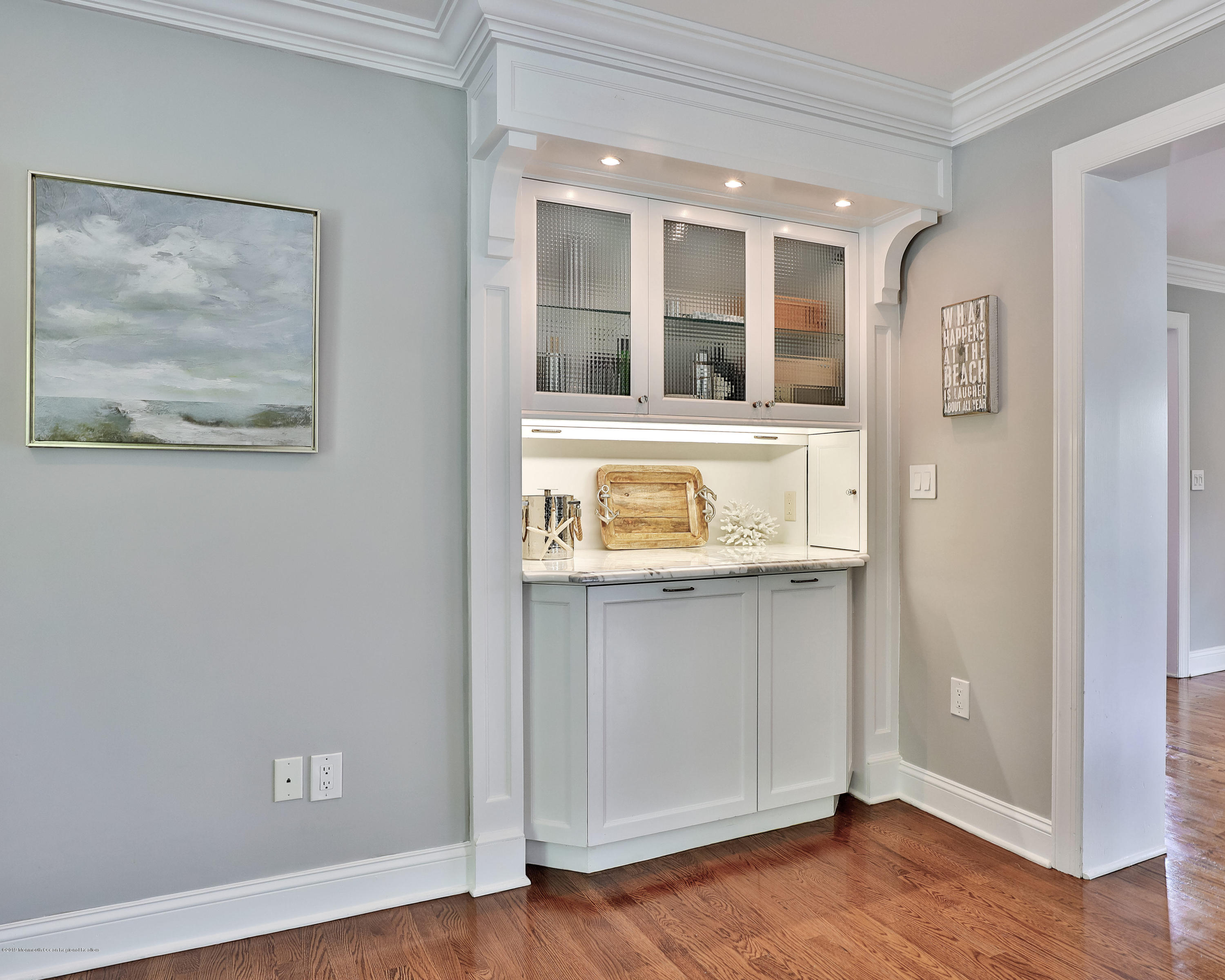 3 Harbor Drive Rumson, NJ 07760 - Photo 11 of 29 a view of an empty room with wooden floor and a window