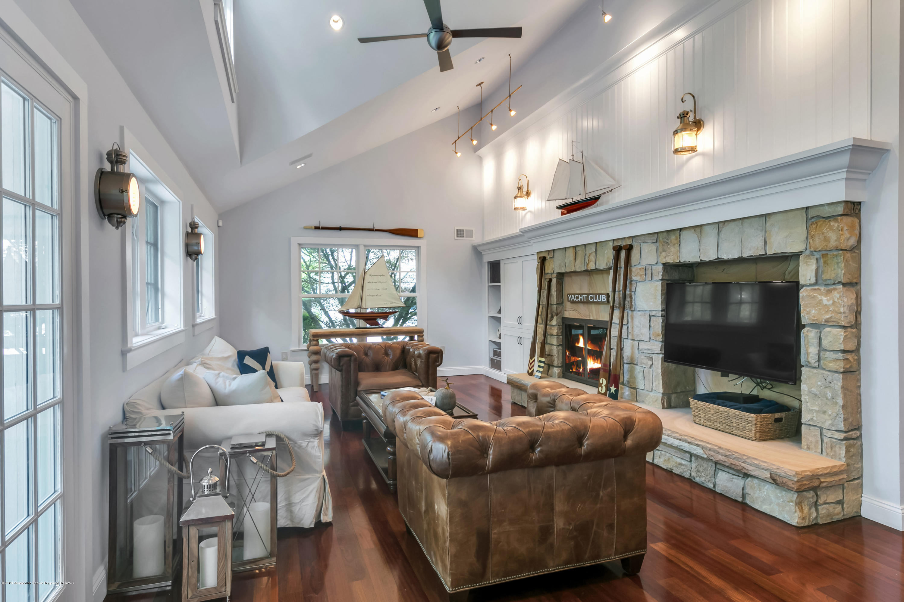 3 Harbor Drive Rumson, NJ 07760 - Photo 12 of 29 a living room with furniture and a flat screen tv