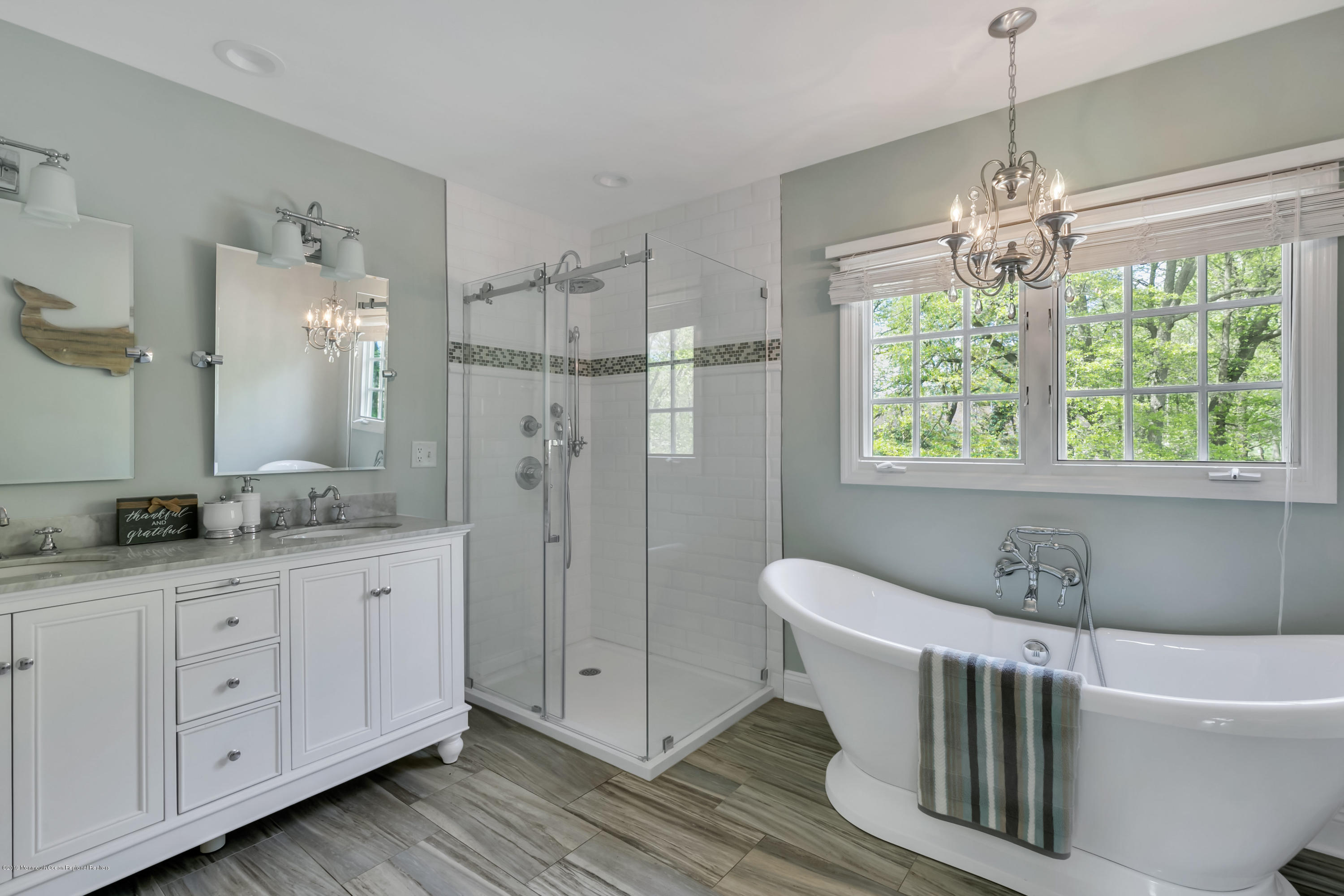 3 Harbor Drive Rumson, NJ 07760 - Photo 15 of 29 a bathroom with a granite countertop sink and a mirror