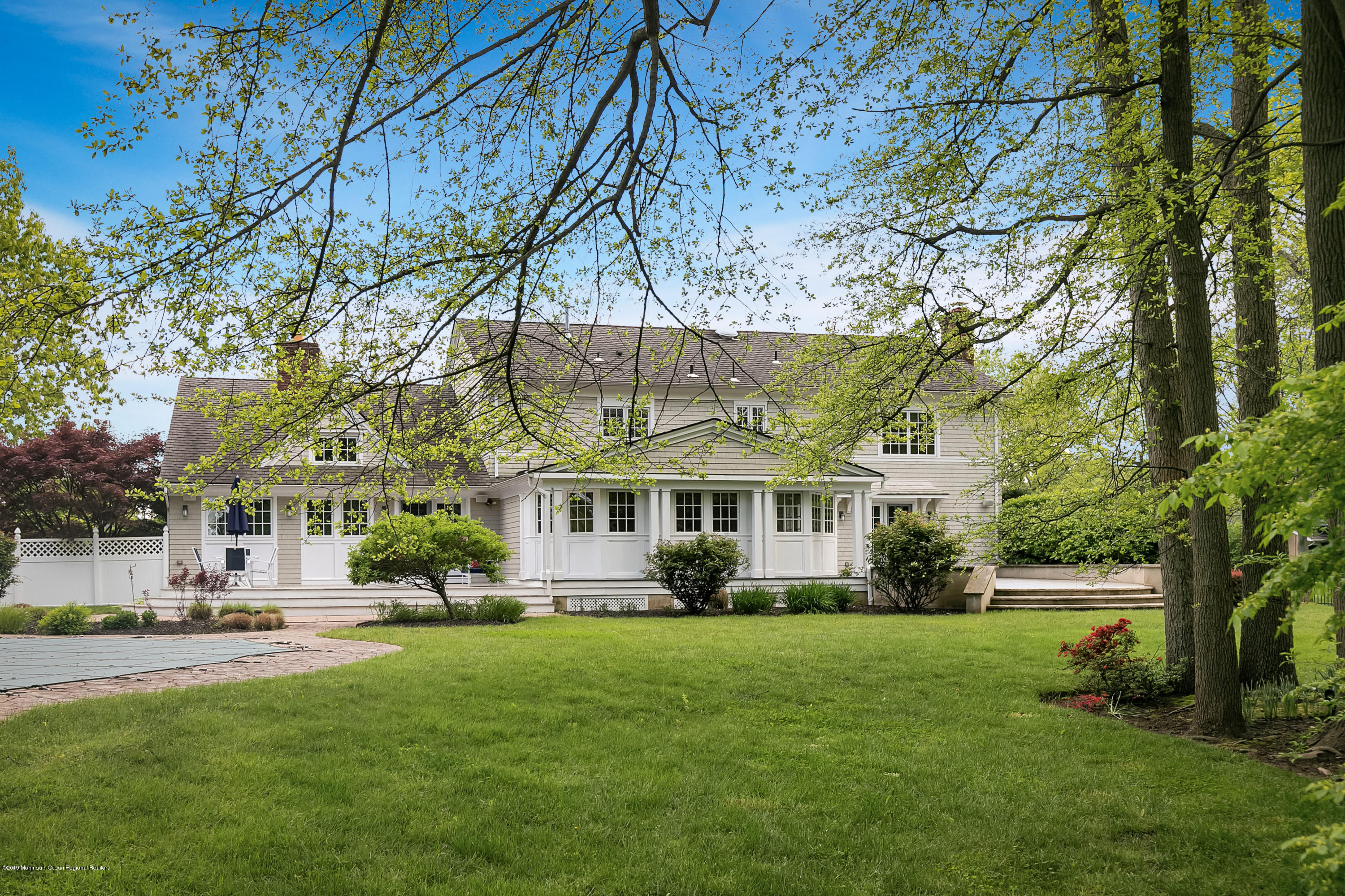 3 Harbor Drive Rumson, NJ 07760 - Photo 23 of 29 a front view of house with yard and green space