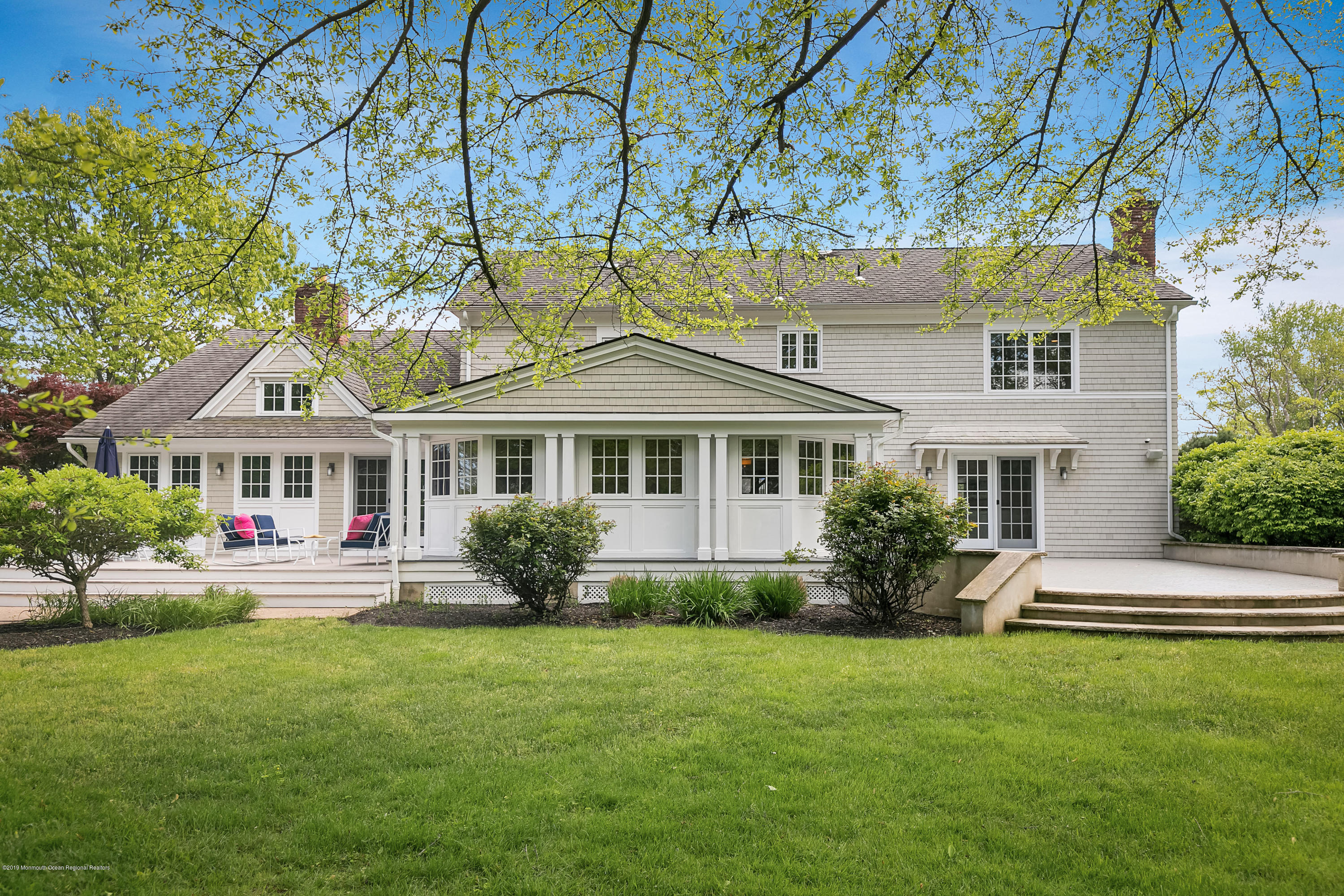 3 Harbor Drive Rumson, NJ 07760 - Photo 26 of 29 a front view of a house with yard and green space