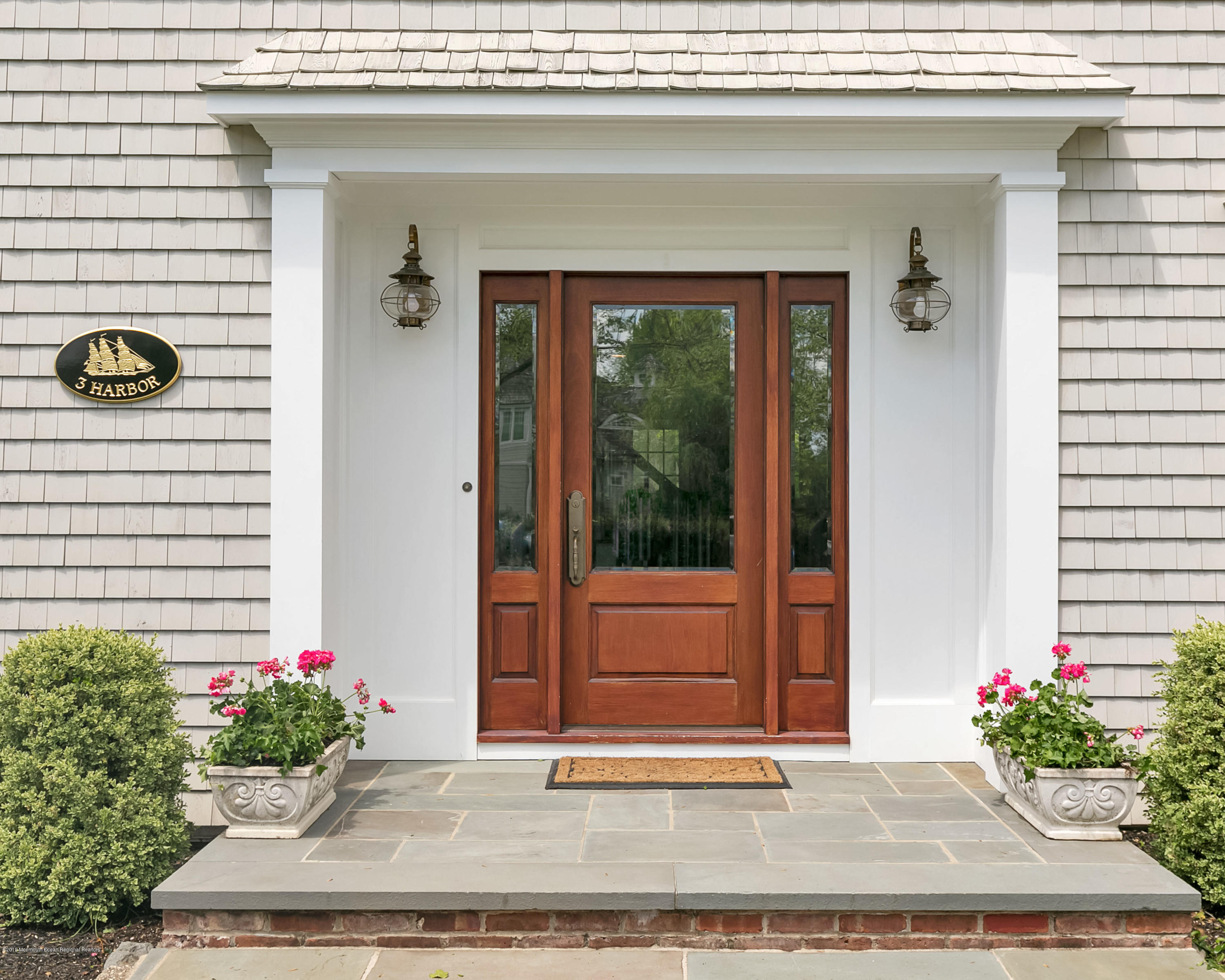 3 Harbor Drive Rumson, NJ 07760 - Photo 3 of 29 a potted plant on the side of a building