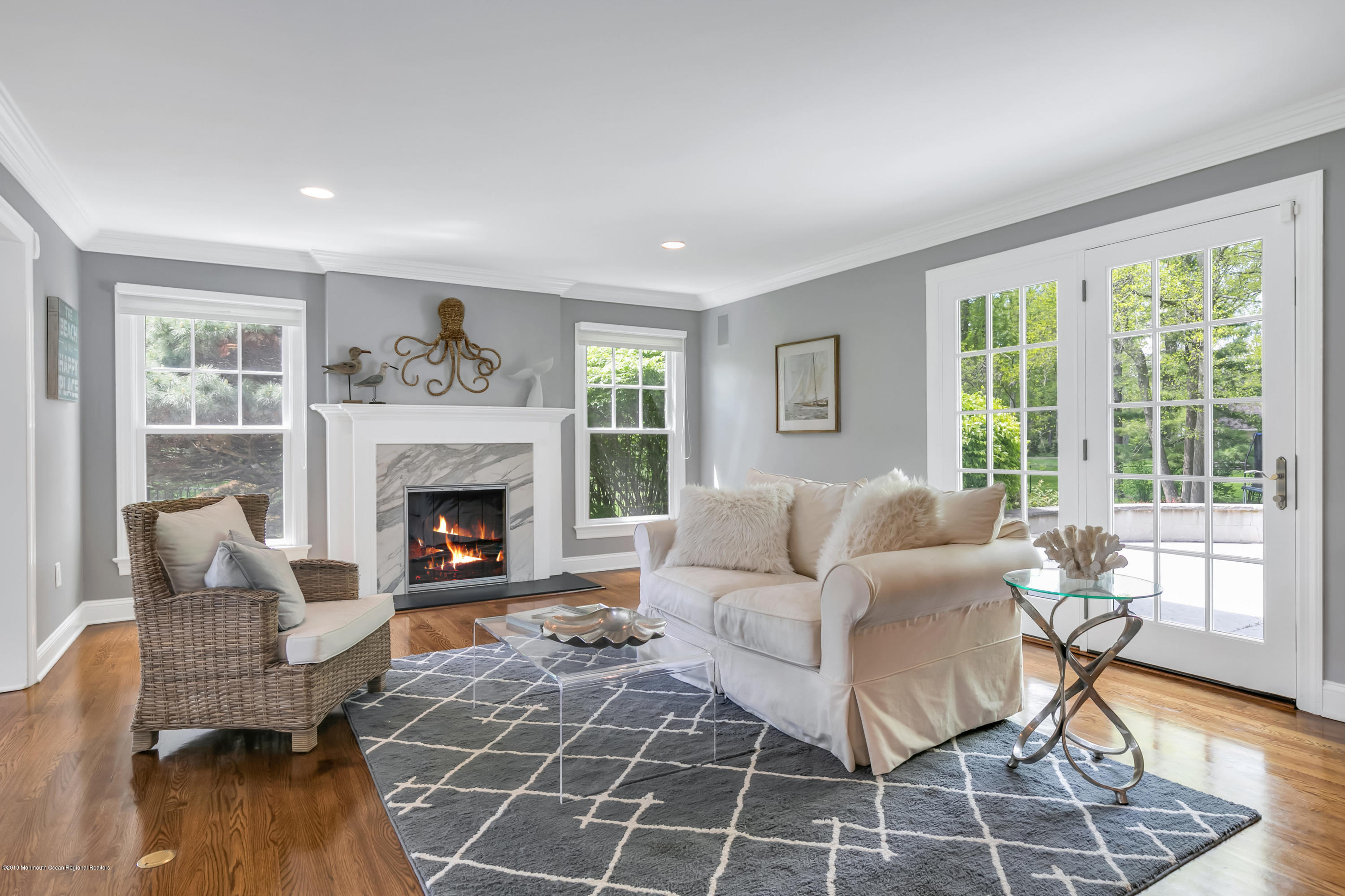 3 Harbor Drive Rumson, NJ 07760 - Photo 4 of 29 a living room with furniture and a fireplace