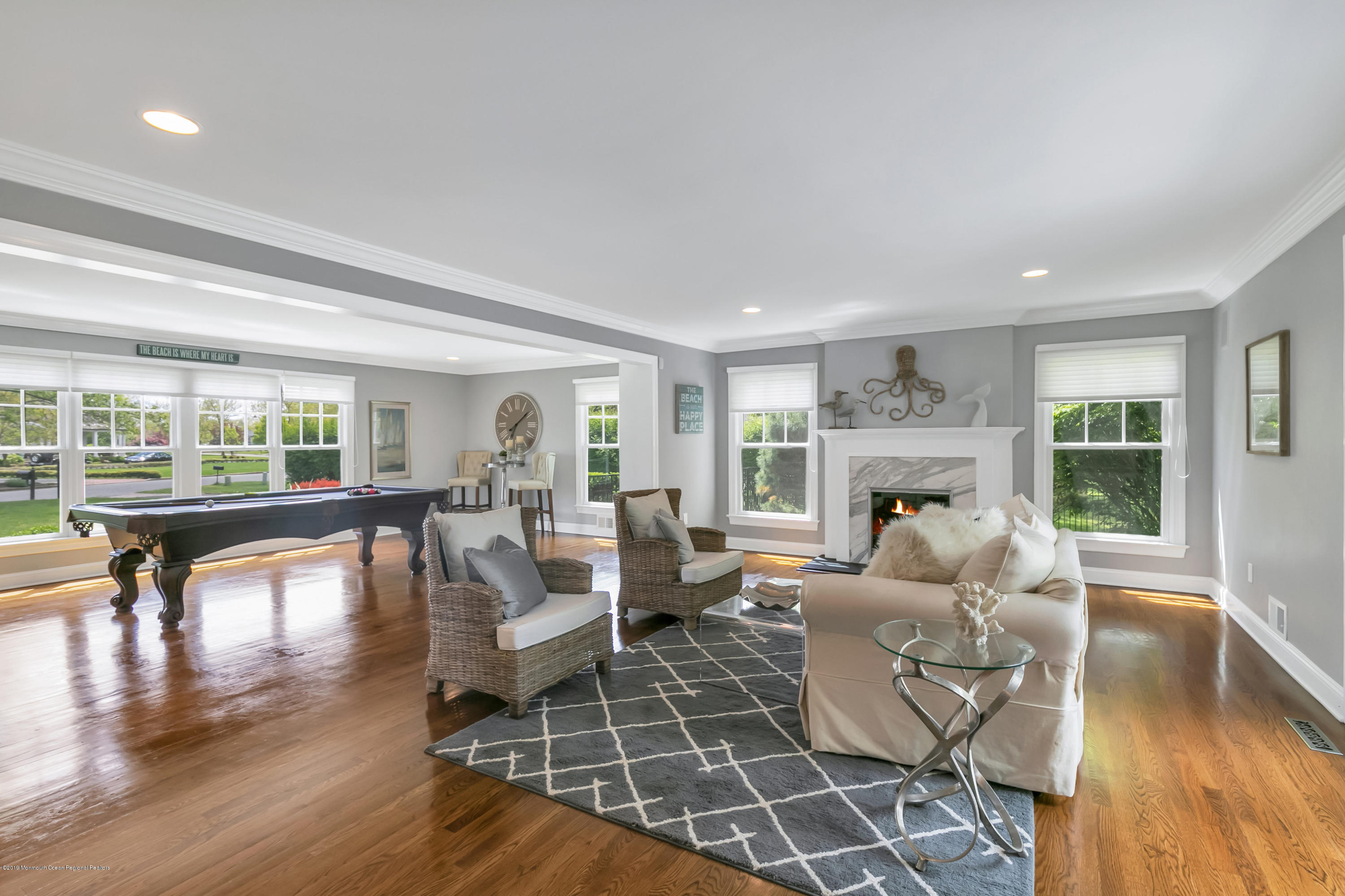 3 Harbor Drive Rumson, NJ 07760 - Photo 6 of 29 a living room with fireplace furniture and a large window