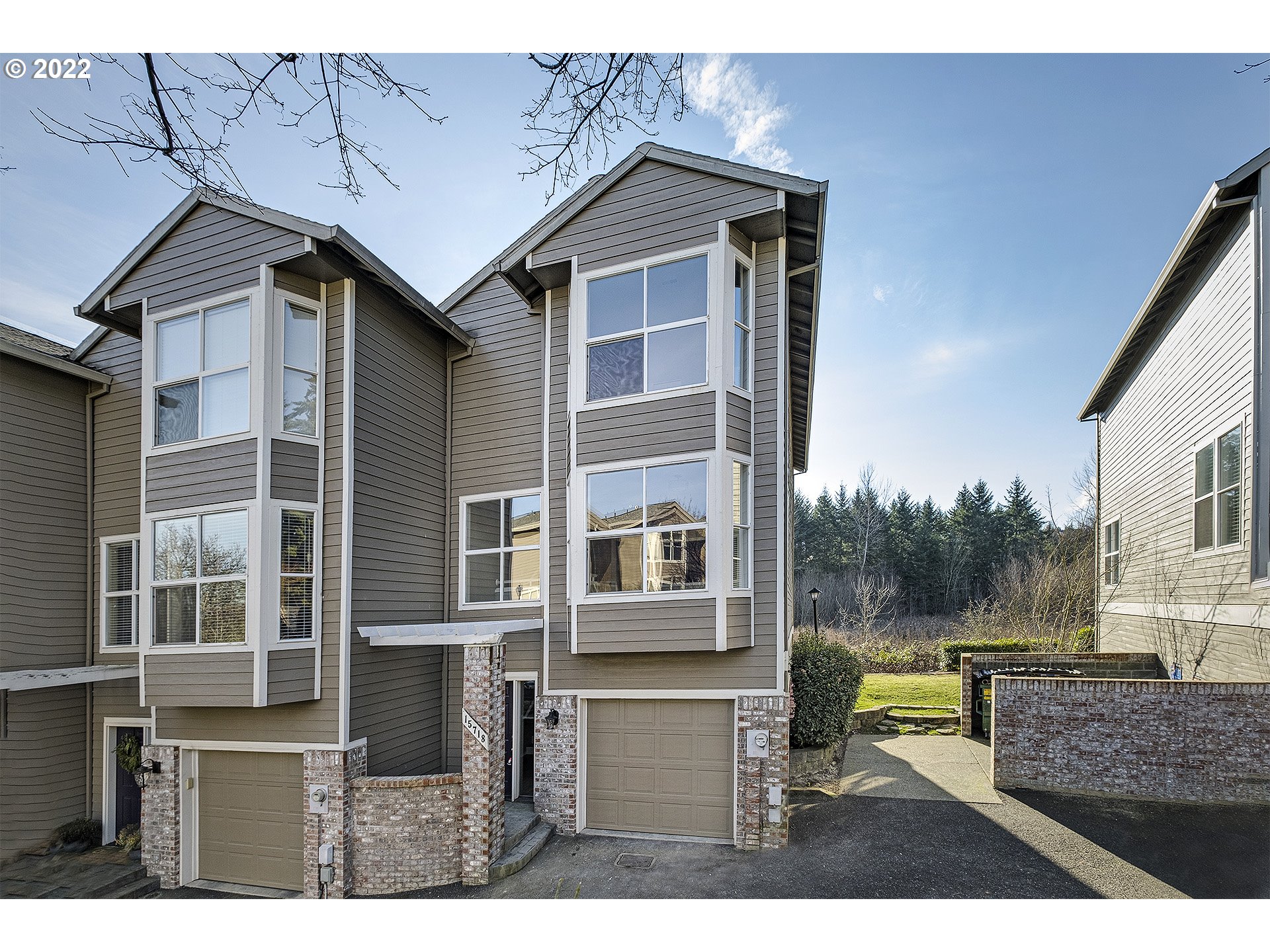 15718 Southwest Flagstone Drive Beaverton, OR 97007 - Photo 1 of 32 a view of house with a outdoor space