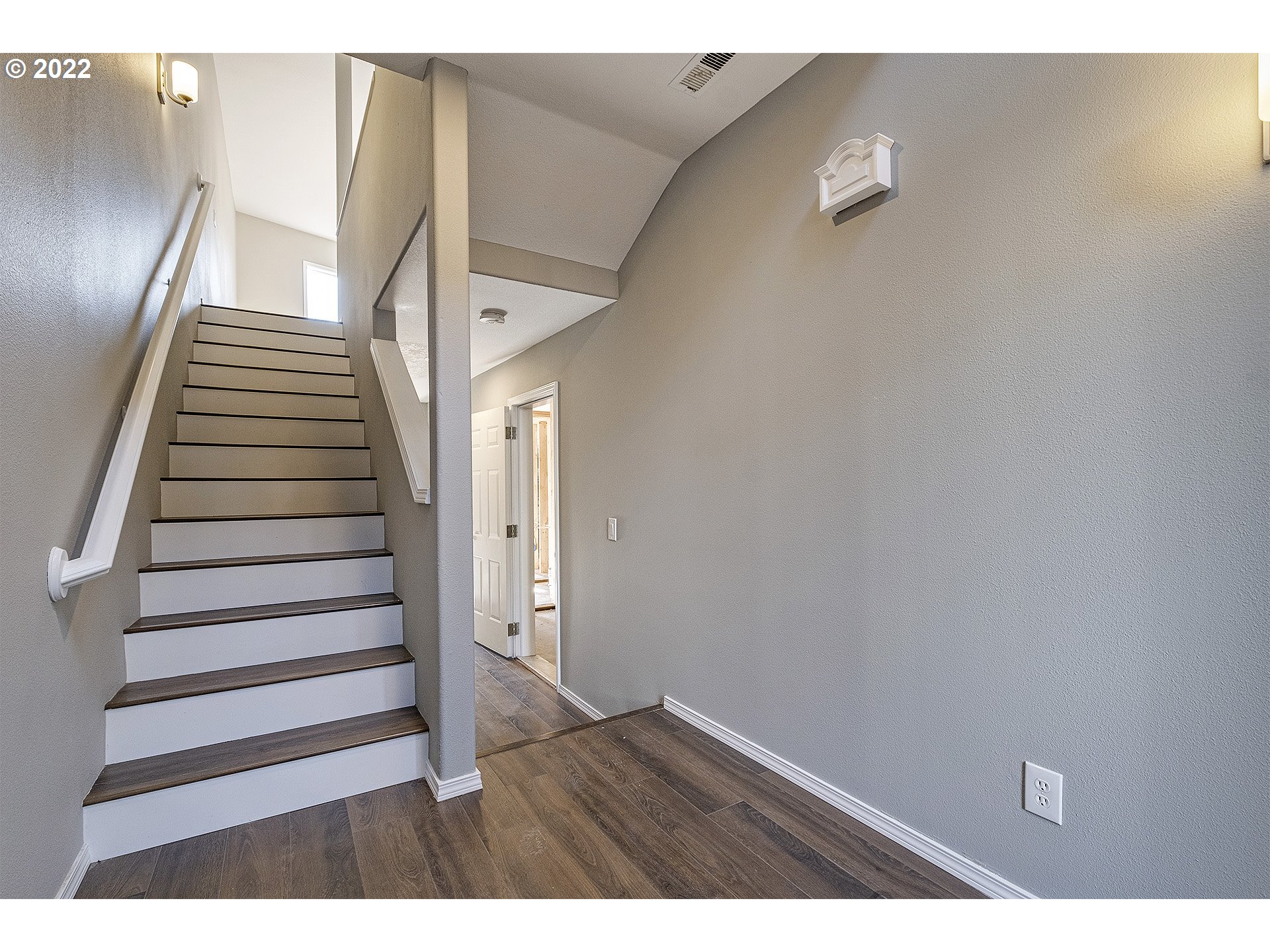 15718 Southwest Flagstone Drive Beaverton, OR 97007 - Photo 2 of 32 a view of entryway with wooden floor