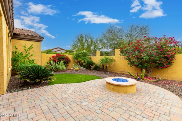 a view of a fireplace and a garden in the background
