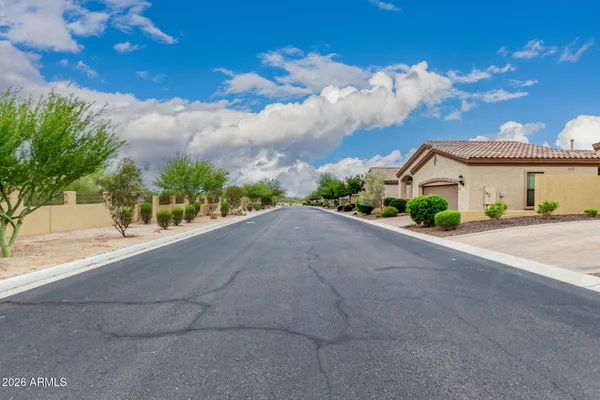 an aerial view of a house with a lake view