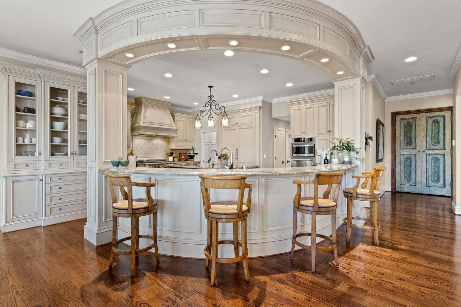 10676 Wilton Road Elk Grove, CA 95624 - Photo 31 of 71 a dining hall with stainless steel appliances kitchen island granite countertop a dining table chairs and view living room