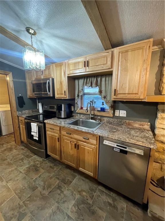 554 Waynesburg Road Washington, PA 15301 - Photo 10 of 35 a kitchen with stainless steel appliances granite countertop a stove sink and cabinets