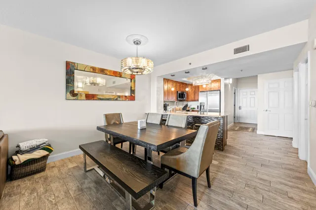 a view of a dining room with furniture