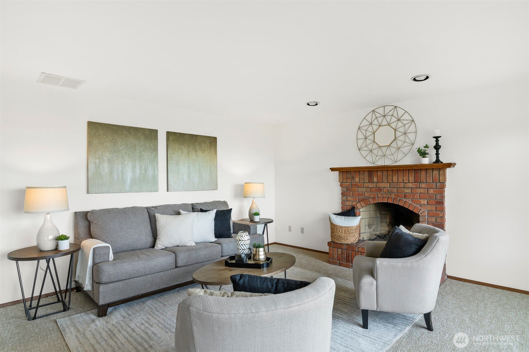 4631 View Drive Everett, WA 98203 - Photo 12 of 40 a living room with furniture a fireplace and a potted plant
