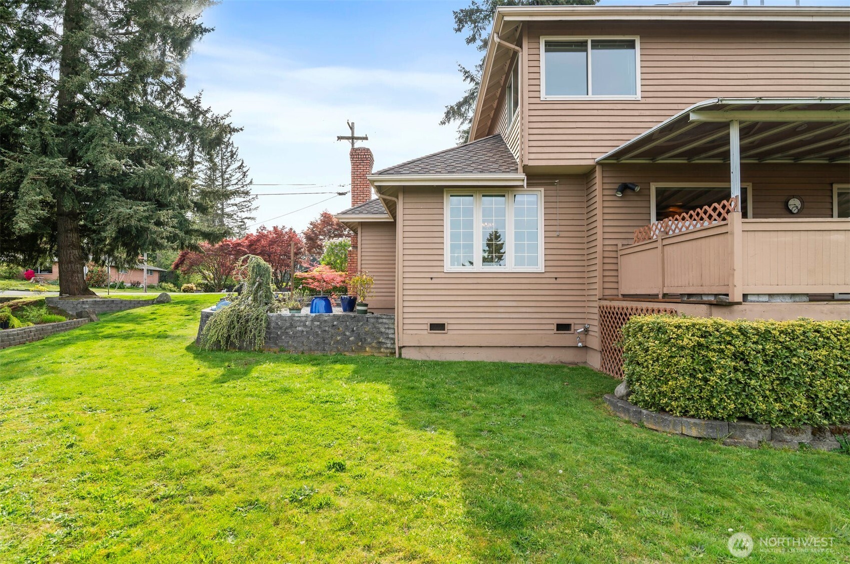 4631 View Drive Everett, WA 98203 - Photo 36 of 40 a view of a house with a yard and sitting area