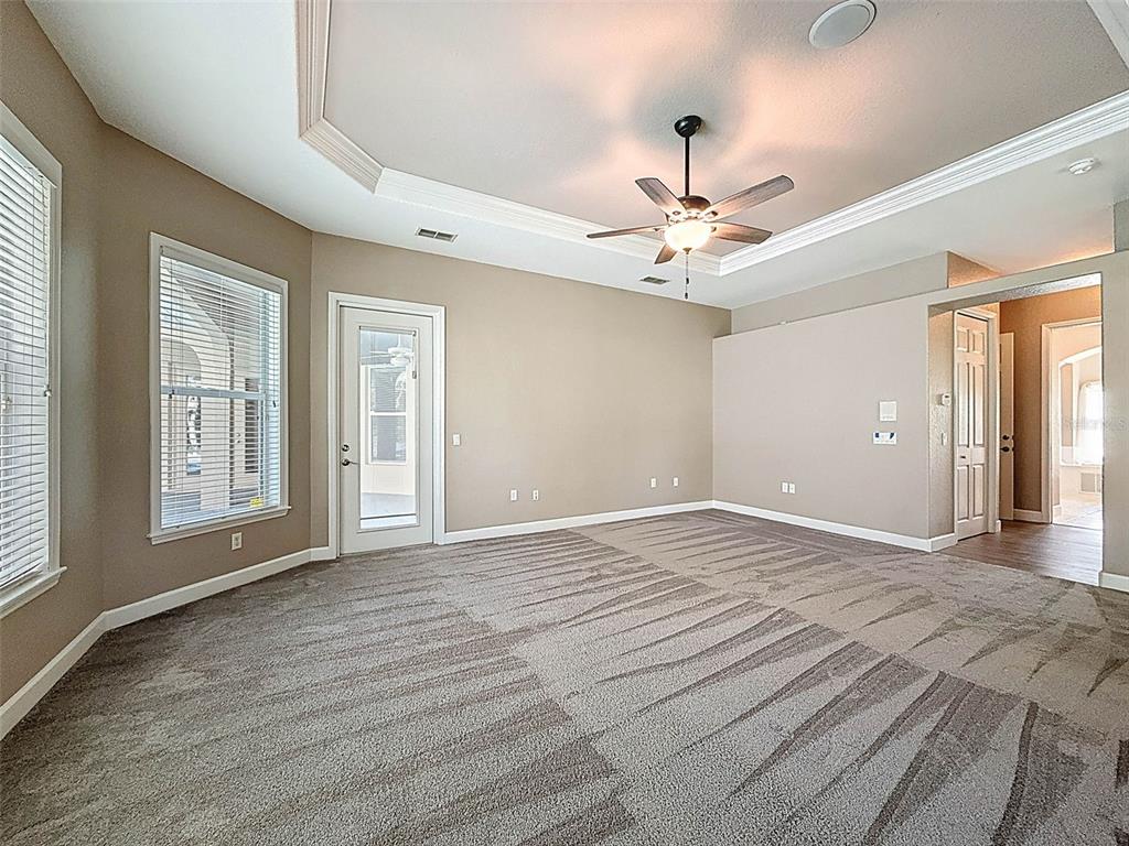 11235 Warm Wind Way Weeki Wachee, FL 34613 - Photo 36 of 93 a view of an empty room with a window