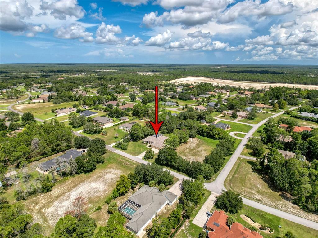 11235 Warm Wind Way Weeki Wachee, FL 34613 - Photo 87 of 93 an aerial view of residential building with outdoor space