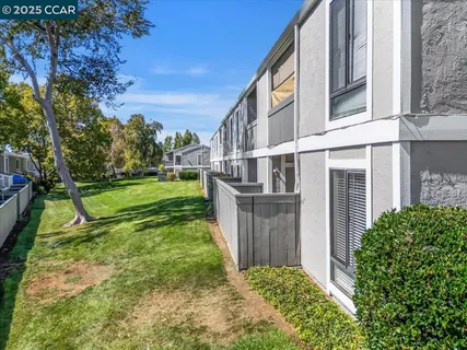 swimming pool view with a outdoor seating