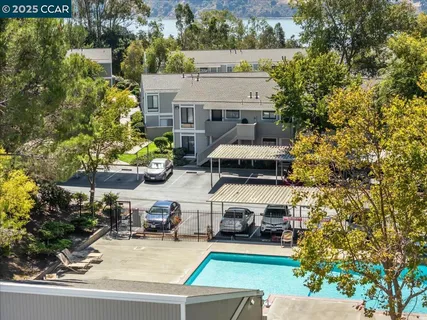 an aerial view of a house with a garden