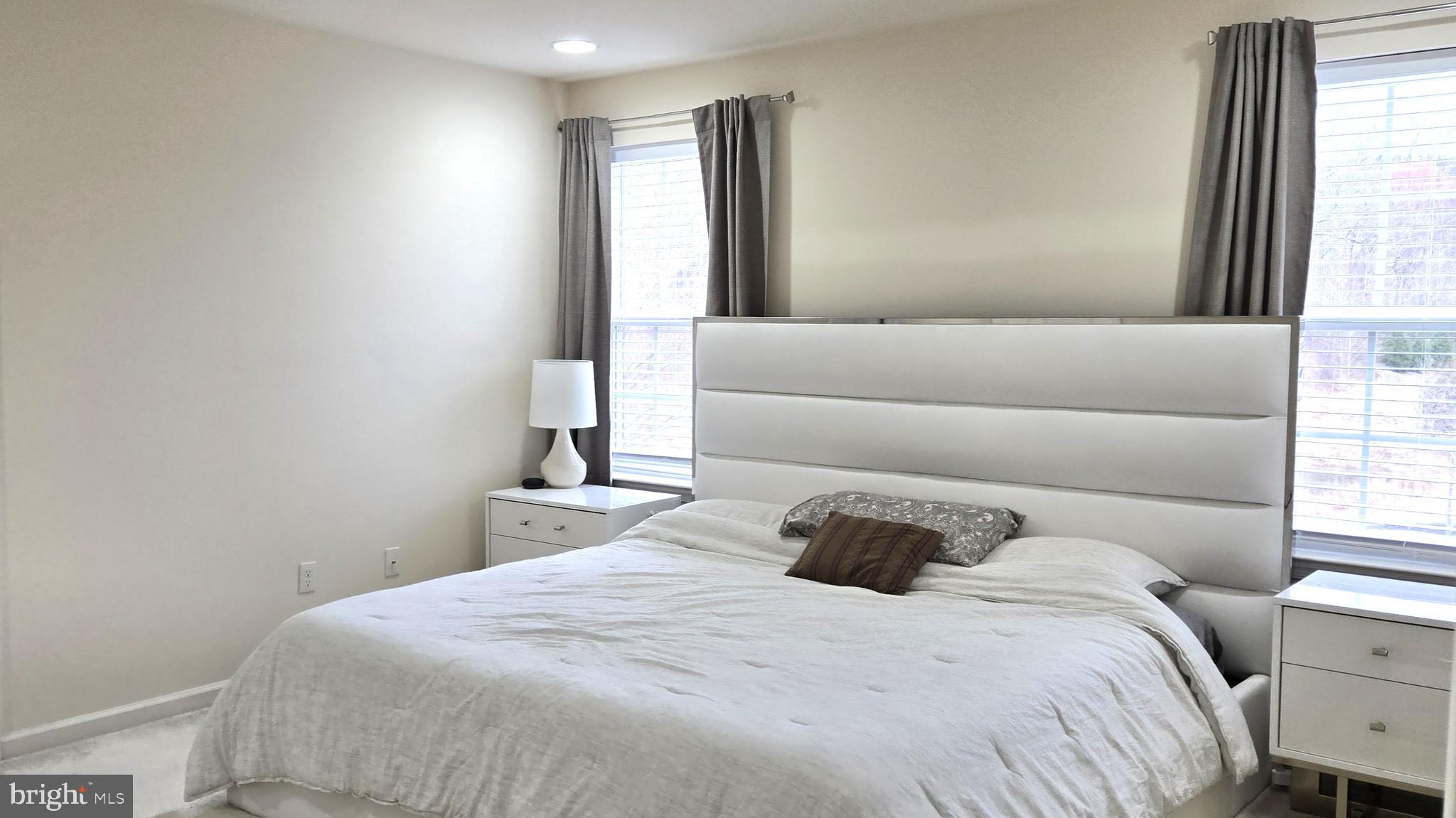 602 Rigel Way Bear, DE 19701 - Photo 15 of 28 a bedroom with a bed and window