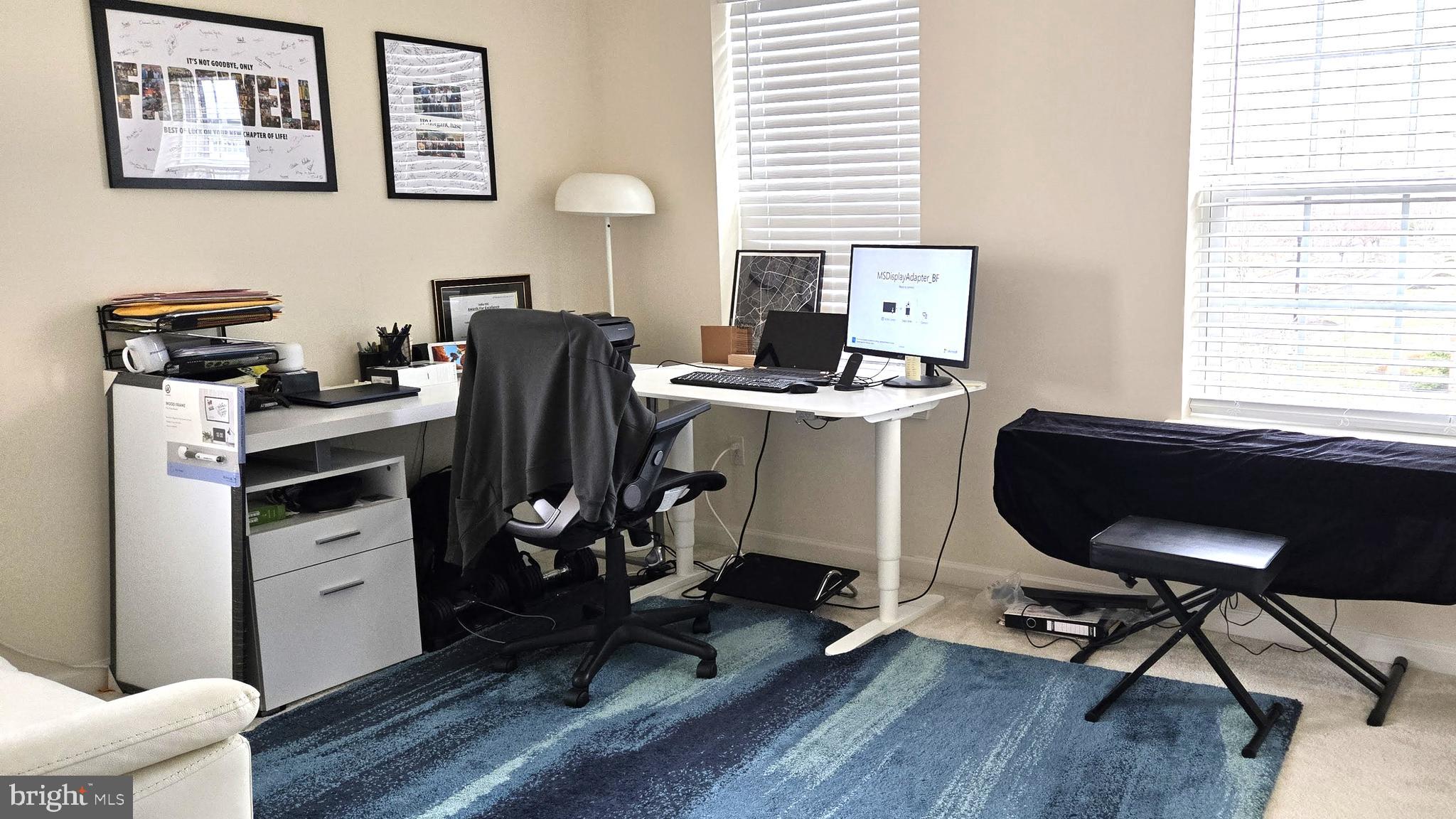 602 Rigel Way Bear, DE 19701 - Photo 19 of 28 a view of a workspace with furniture and a window