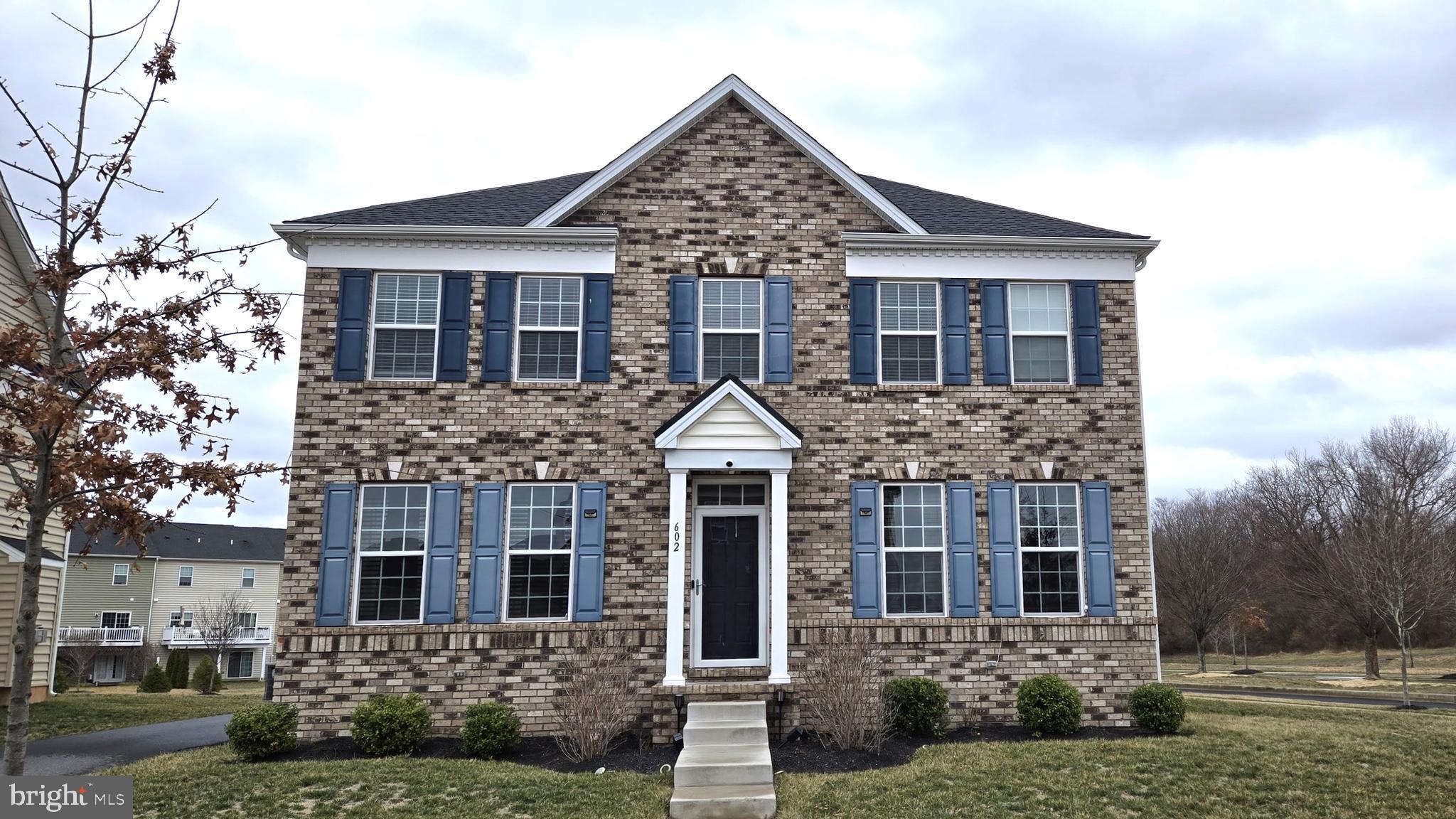 602 Rigel Way Bear, DE 19701 - Photo 2 of 28 front view of a house with a yard
