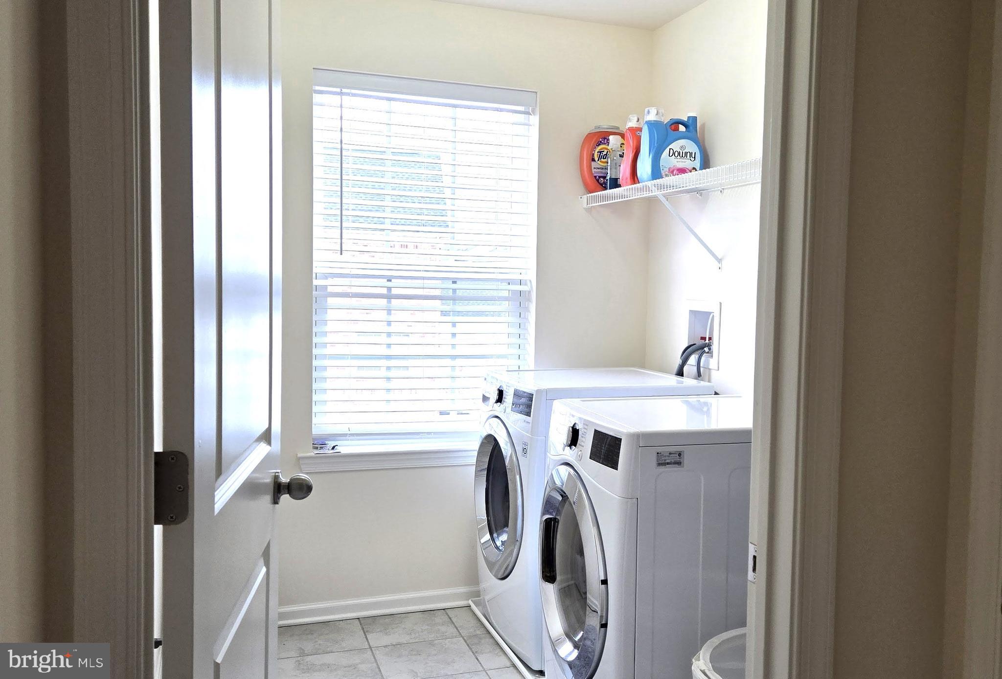 602 Rigel Way Bear, DE 19701 - Photo 21 of 28 a utility room with a sink dryer and washer