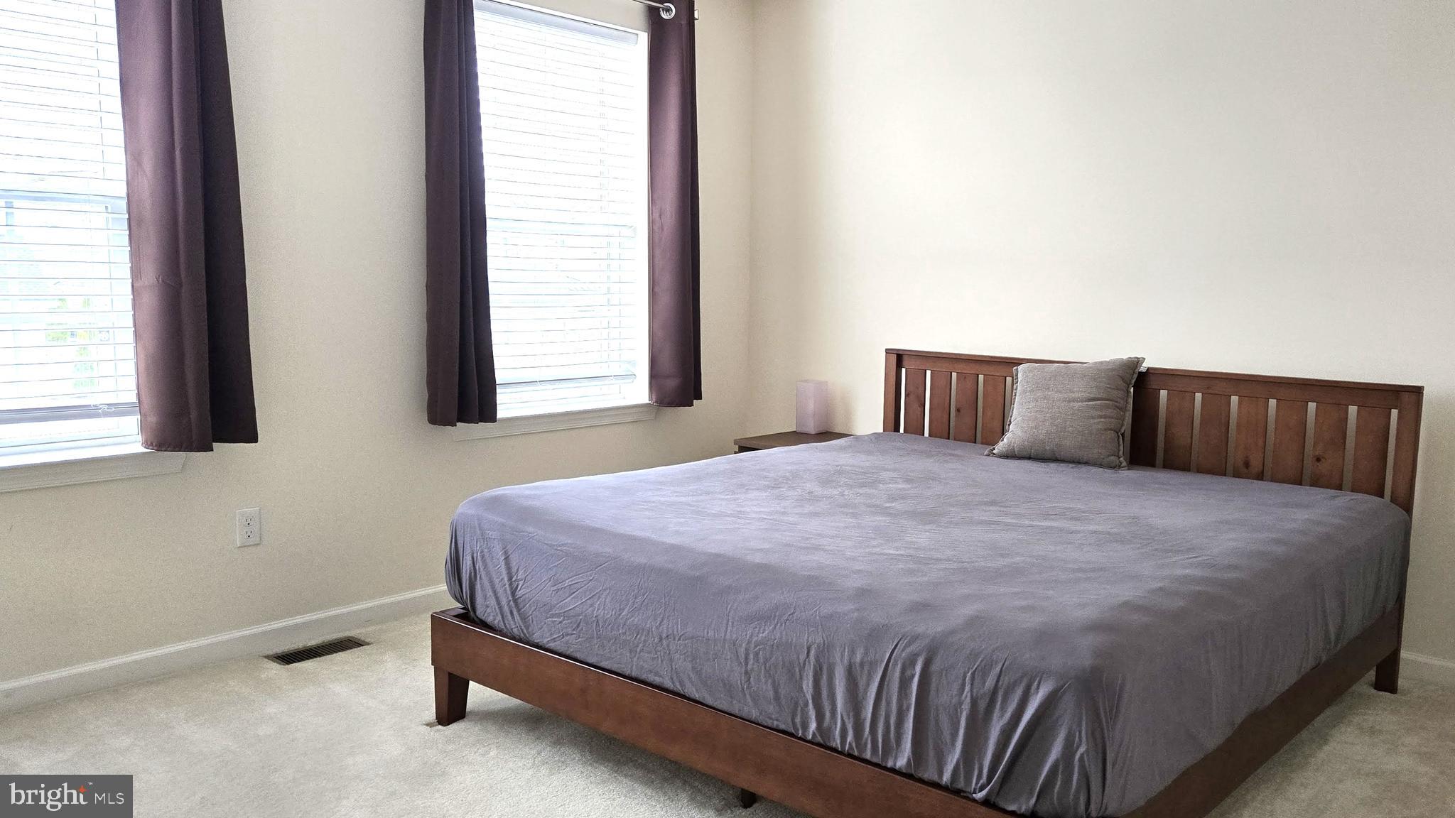 602 Rigel Way Bear, DE 19701 - Photo 23 of 28 a bedroom with a bed and window