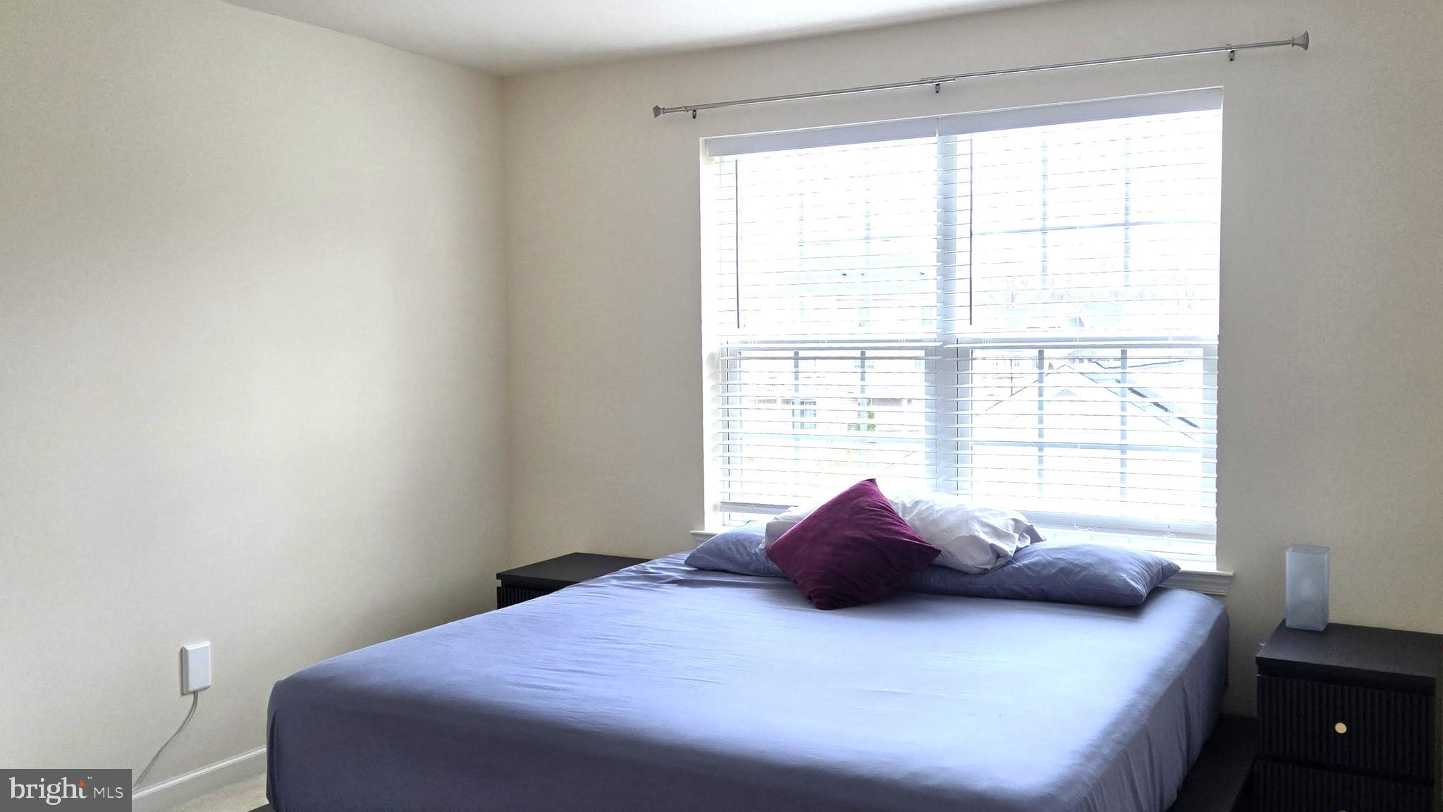 602 Rigel Way Bear, DE 19701 - Photo 25 of 28 a bedroom with a bed and window