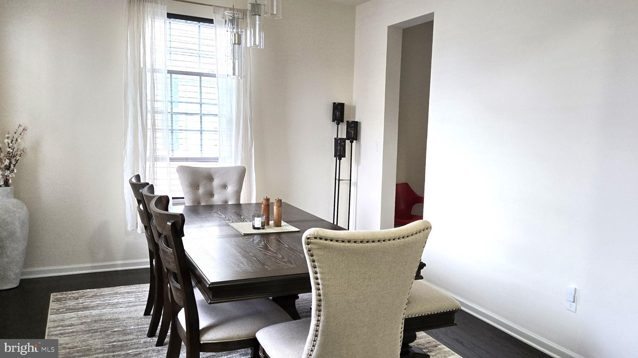 602 Rigel Way Bear, DE 19701 - Photo 4 of 28 a view of a dining room with furniture and window