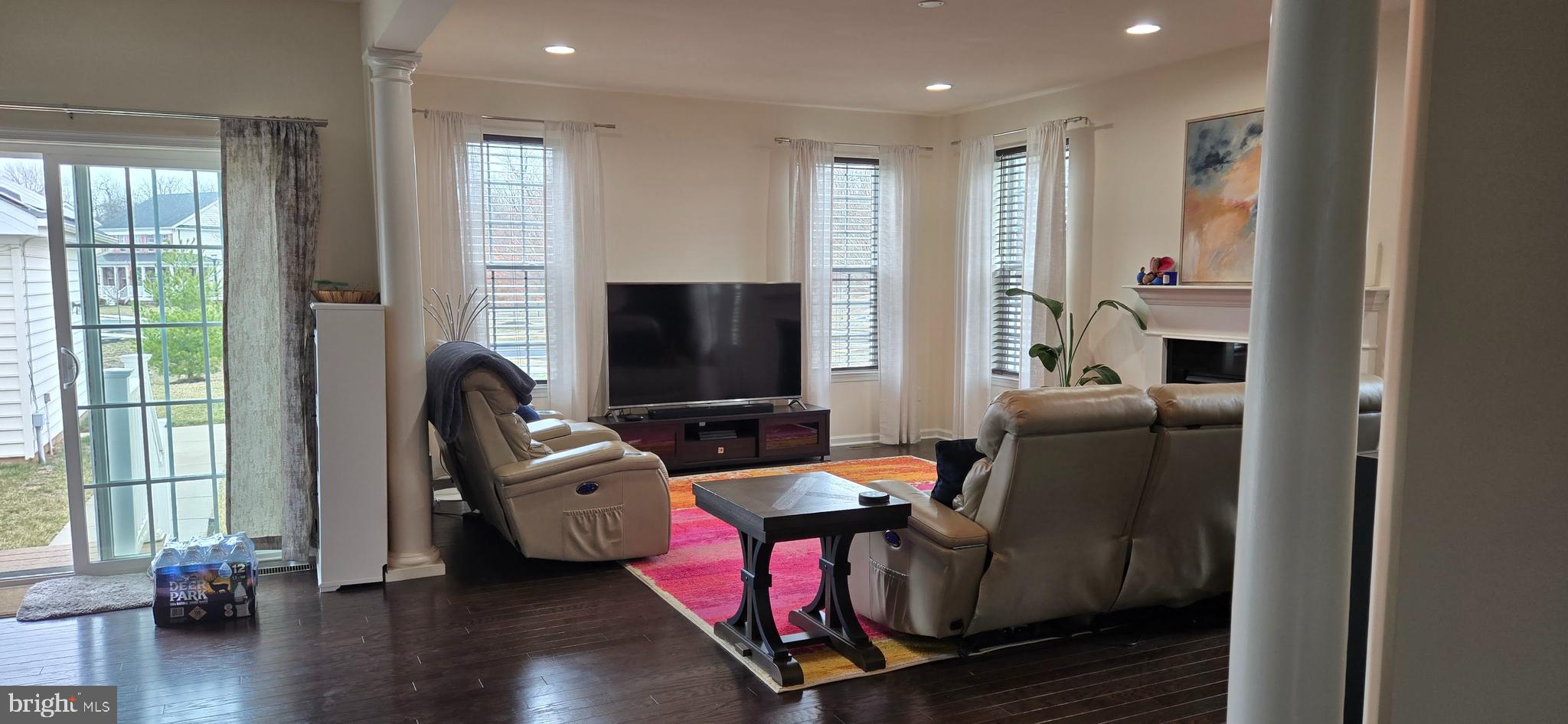 602 Rigel Way Bear, DE 19701 - Photo 6 of 28 a living room with furniture and a flat screen tv