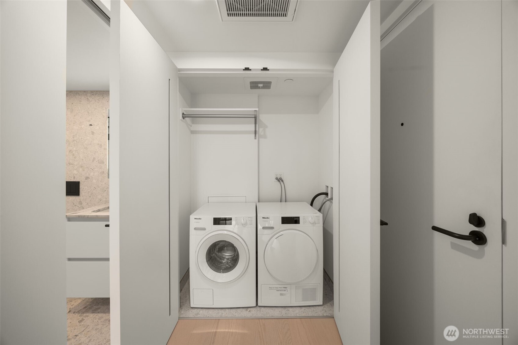 300 Virginia Street, Unit 3607 Seattle, WA 98101 - Photo 15 of 37 a utility room with dryer and washer