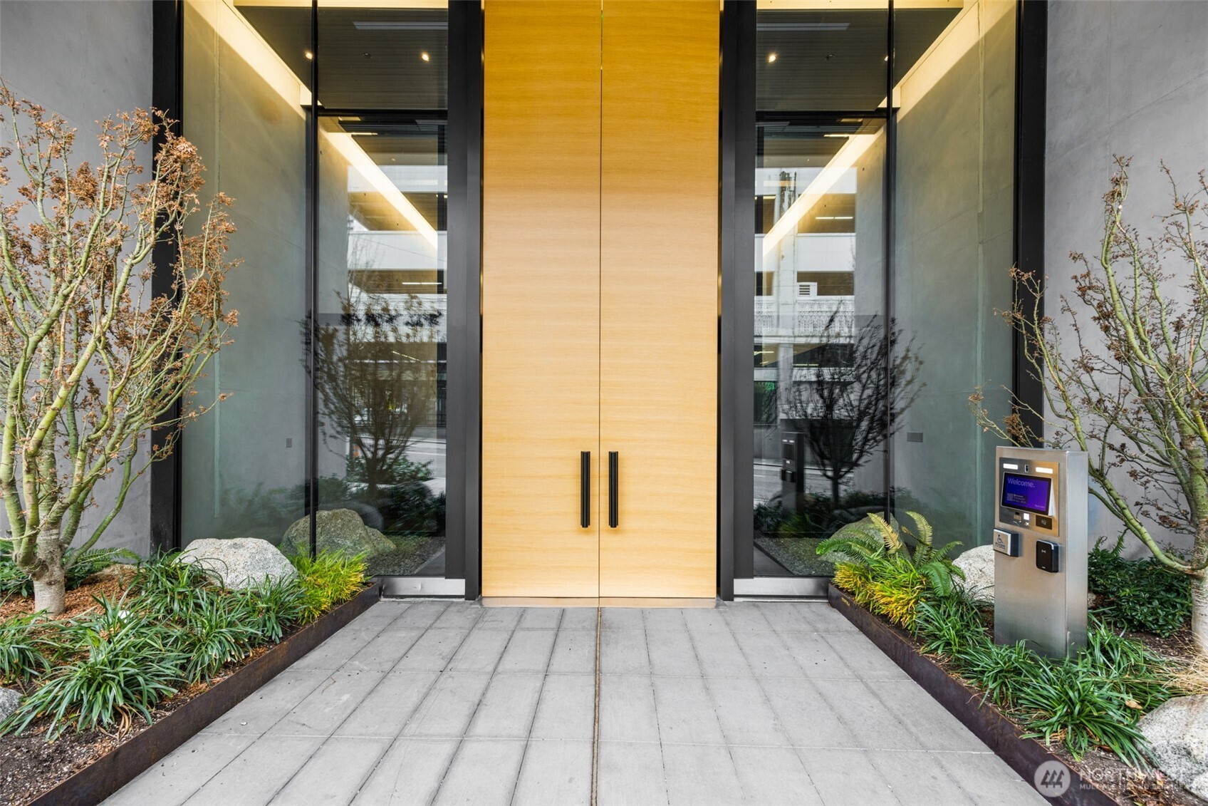 300 Virginia Street, Unit 3607 Seattle, WA 98101 - Photo 16 of 37 a view of a house with a backyard