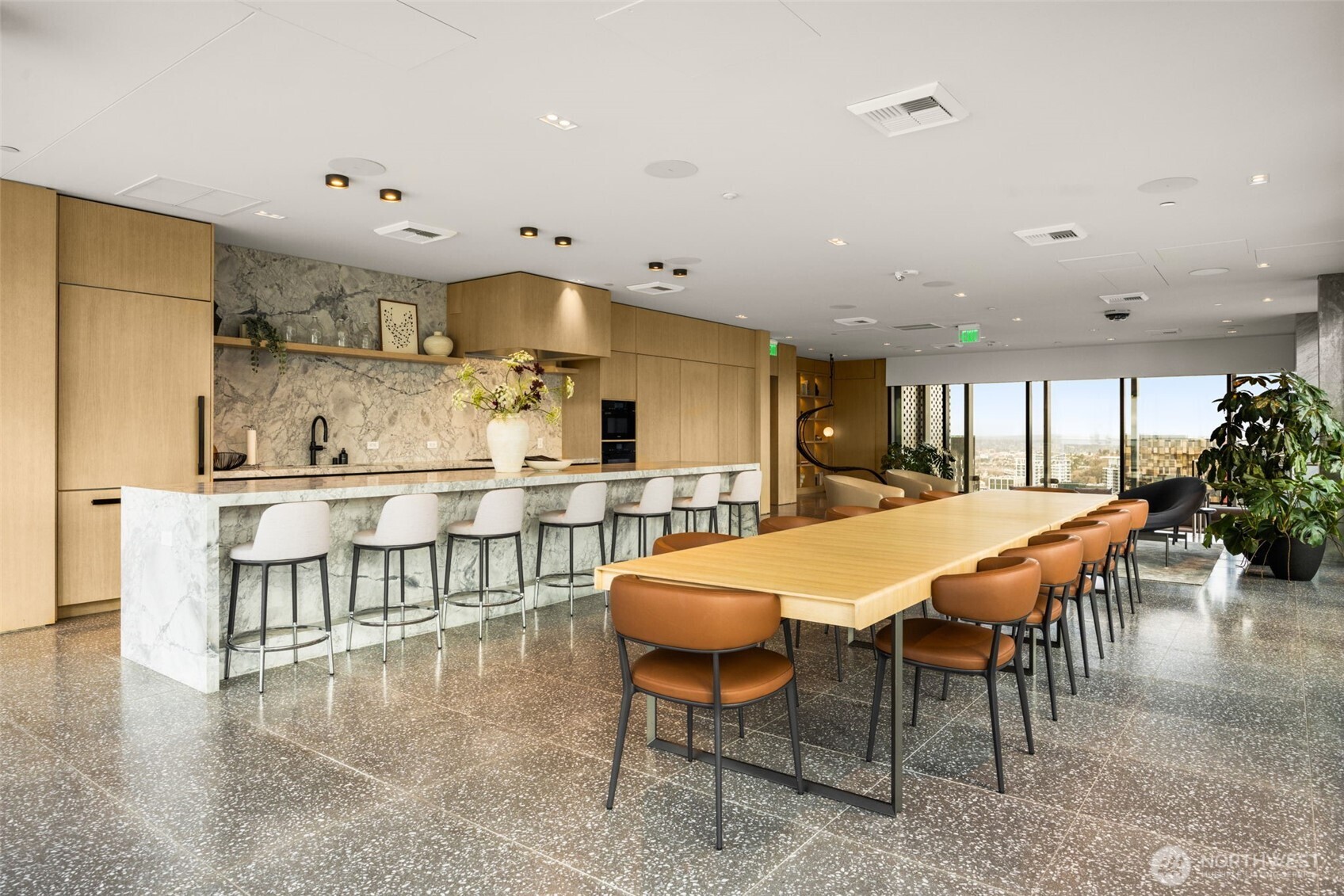 300 Virginia Street, Unit 3607 Seattle, WA 98101 - Photo 21 of 37 a large kitchen with a table and chairs