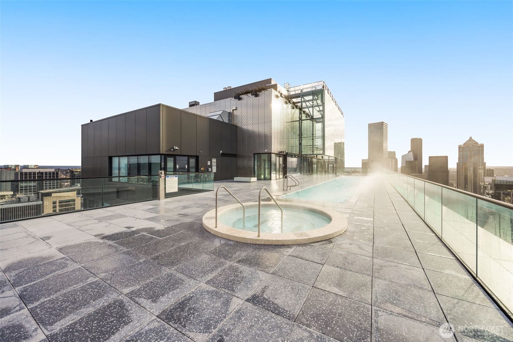 300 Virginia Street, Unit 3607 Seattle, WA 98101 - Photo 23 of 37 a backyard of a house with table and chairs