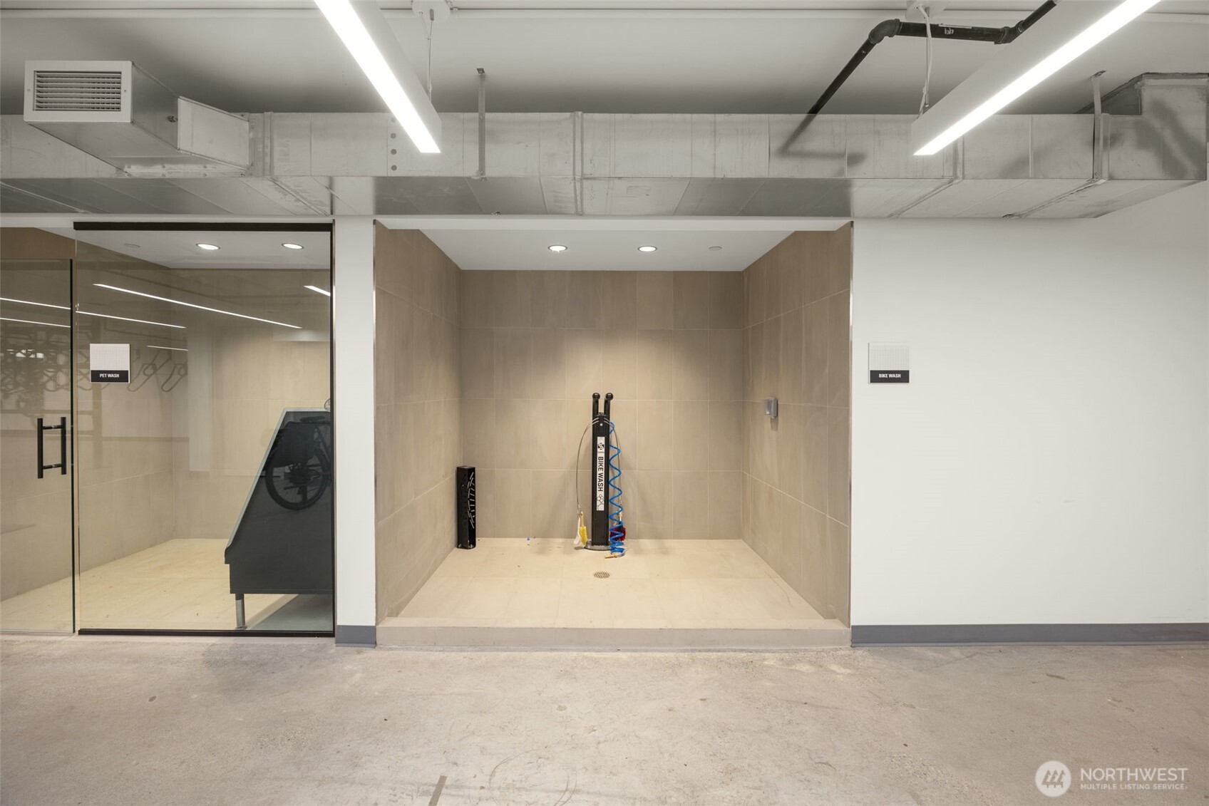 300 Virginia Street, Unit 3607 Seattle, WA 98101 - Photo 33 of 37 a view of a hallway with wooden floor