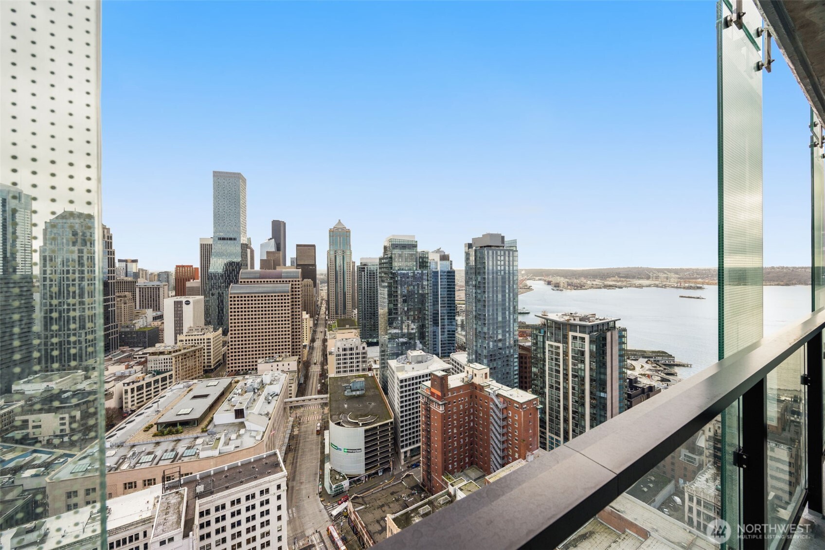 300 Virginia Street, Unit 3607 Seattle, WA 98101 - Photo 5 of 37 a view of a city from a balcony with city view