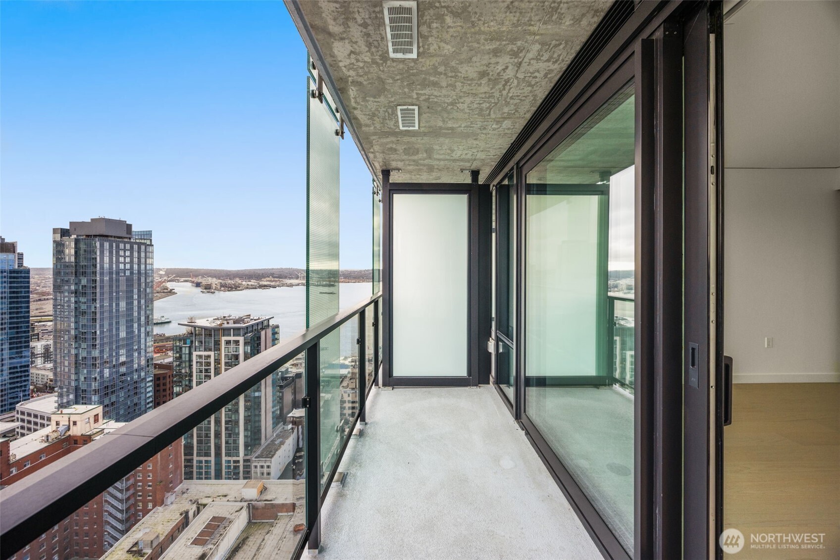 300 Virginia Street, Unit 3607 Seattle, WA 98101 - Photo 6 of 37 a view of balcony with furniture