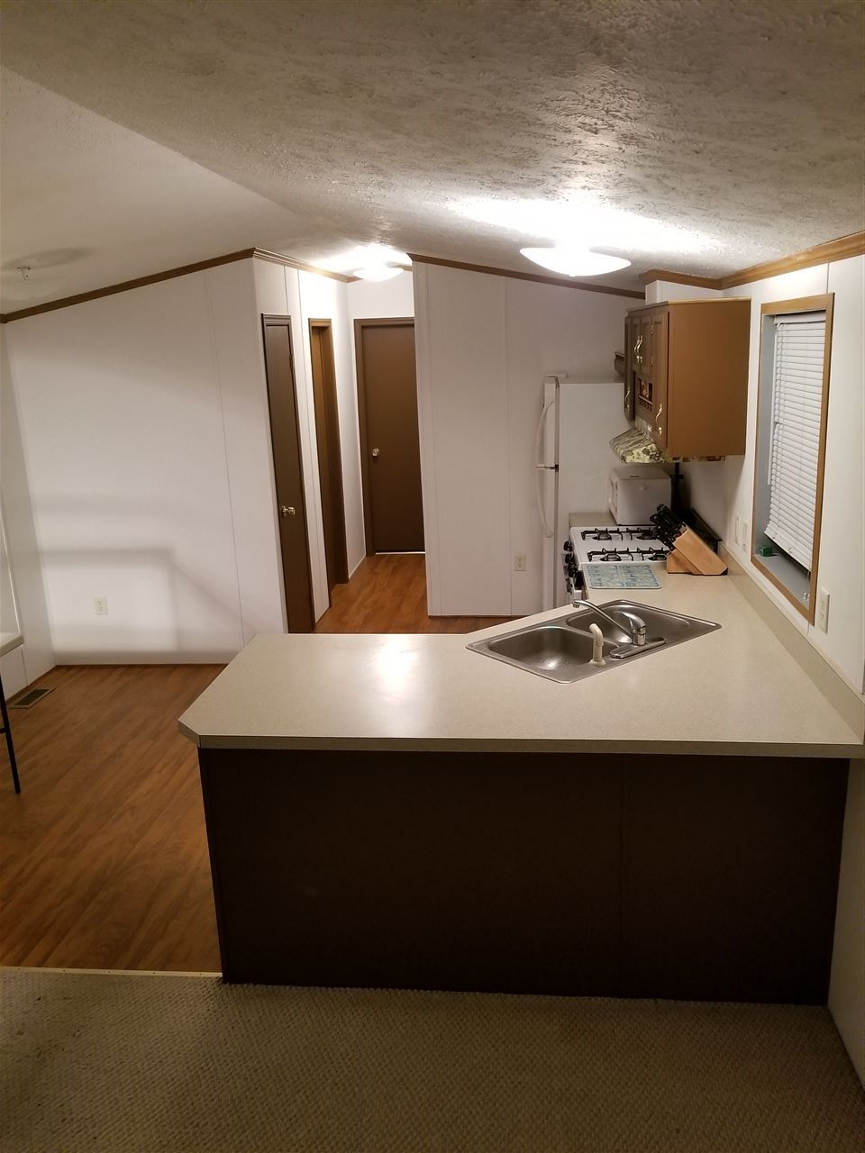 65 Leavitt Road, Unit 12 Pittsfield, NH 03263 - Photo 2 of 10
