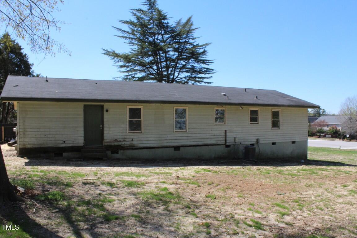 5301 Daleview Drive Raleigh, NC 27610 - Photo 3 of 7 a view of a house with a yard