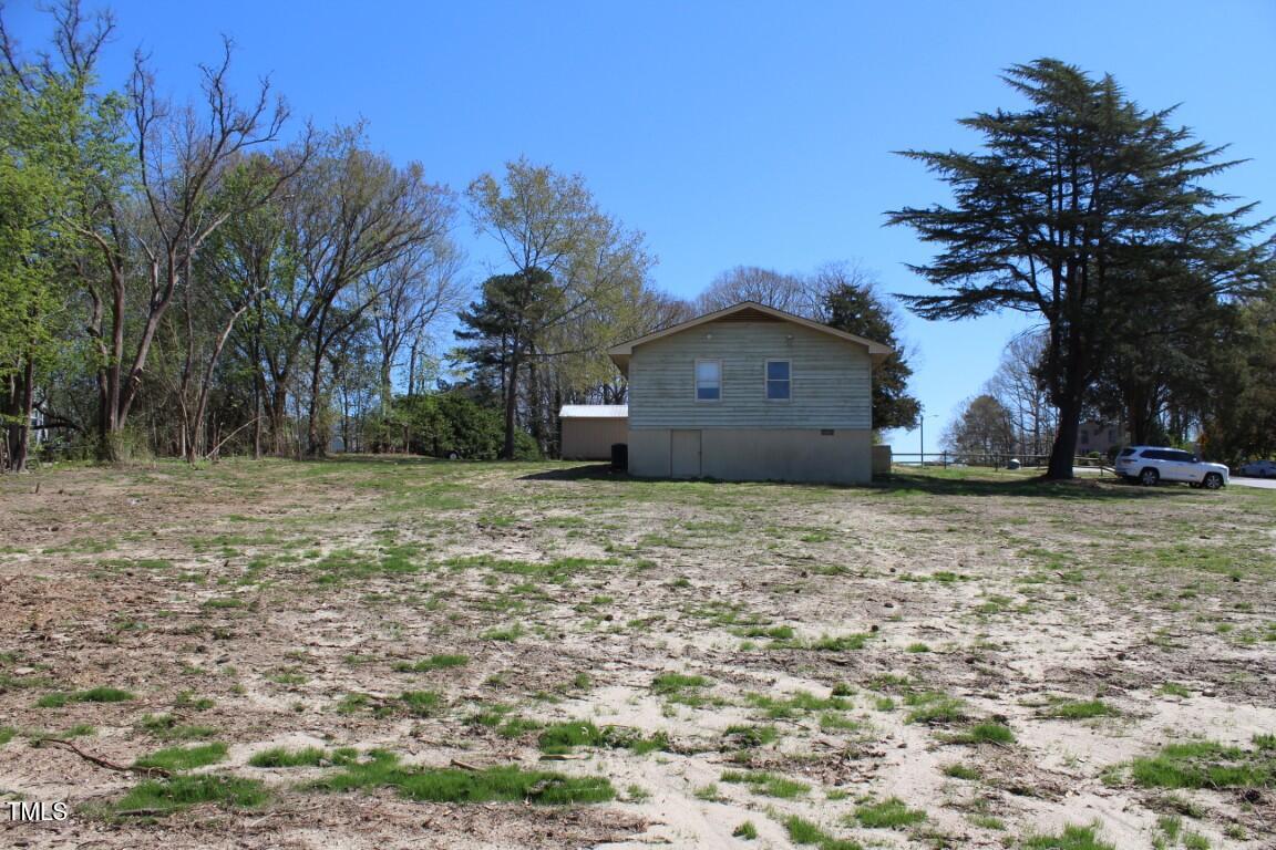 5301 Daleview Drive Raleigh, NC 27610 - Photo 7 of 7 a view of a house with a yard