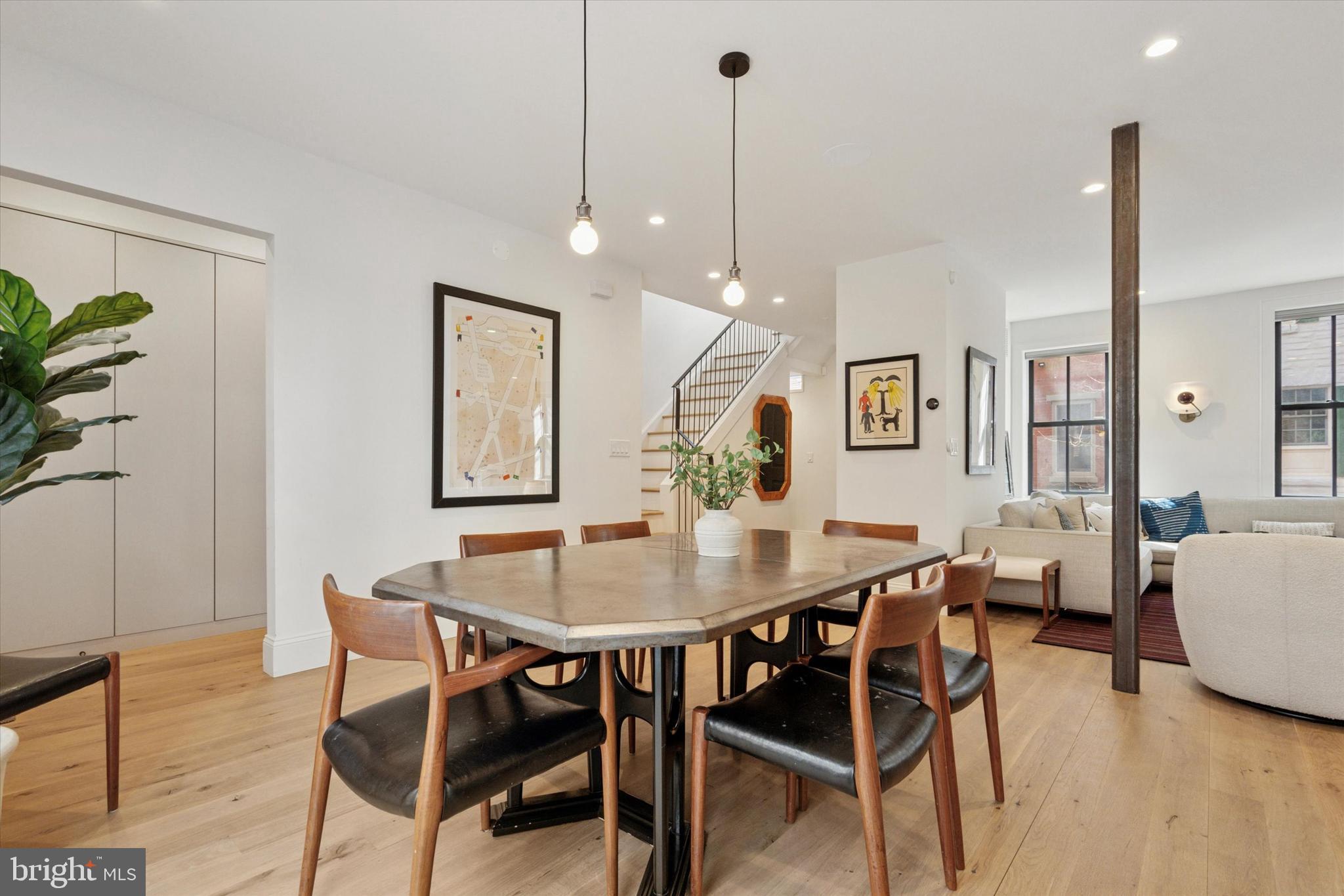 1725-27 Addison Street Philadelphia, PA 19146 - Photo 12 of 43 a view of a dining room with furniture and wooden floor