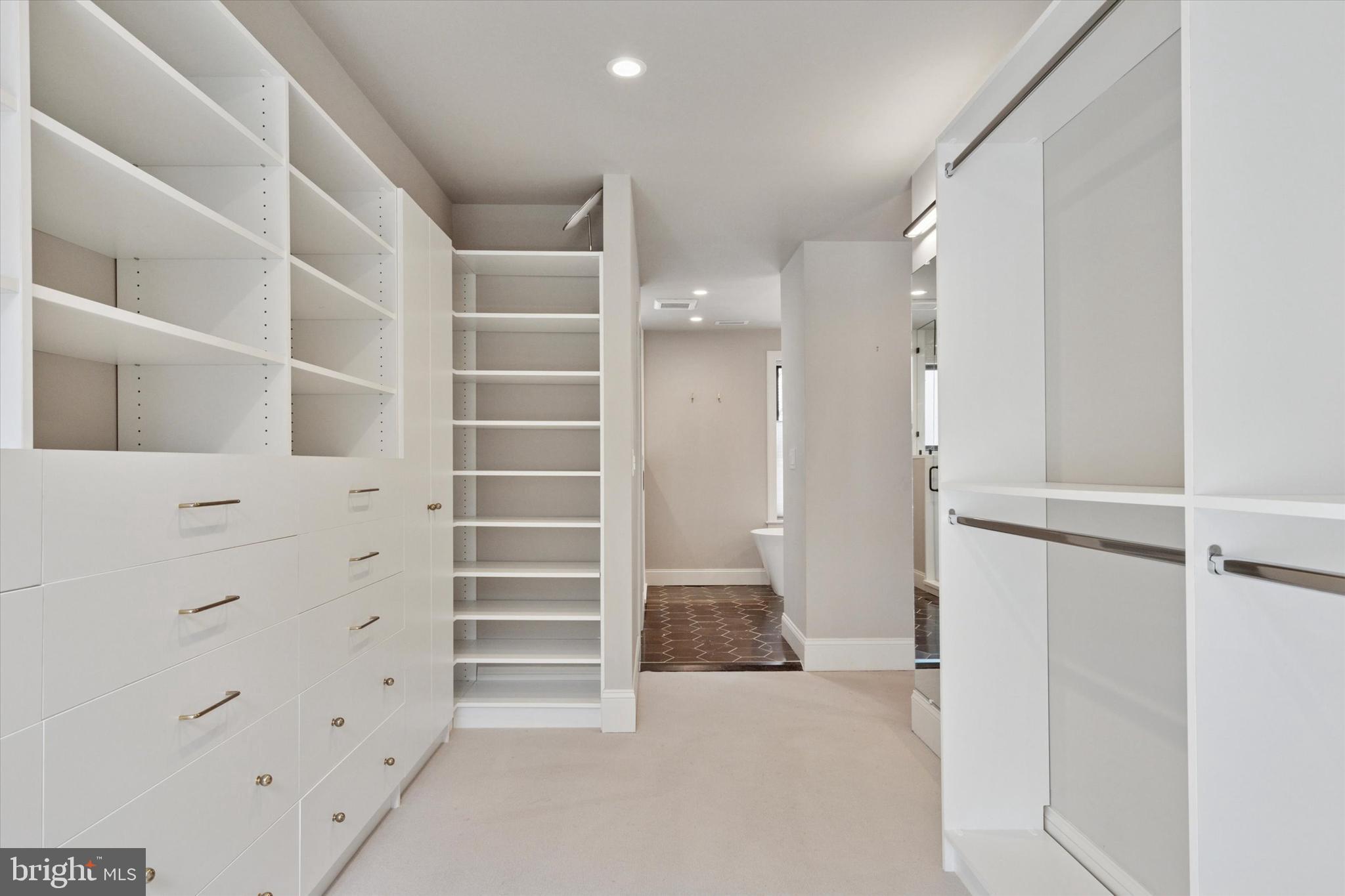 1725-27 Addison Street Philadelphia, PA 19146 - Photo 19 of 43 a view of walk in closet with empty racks