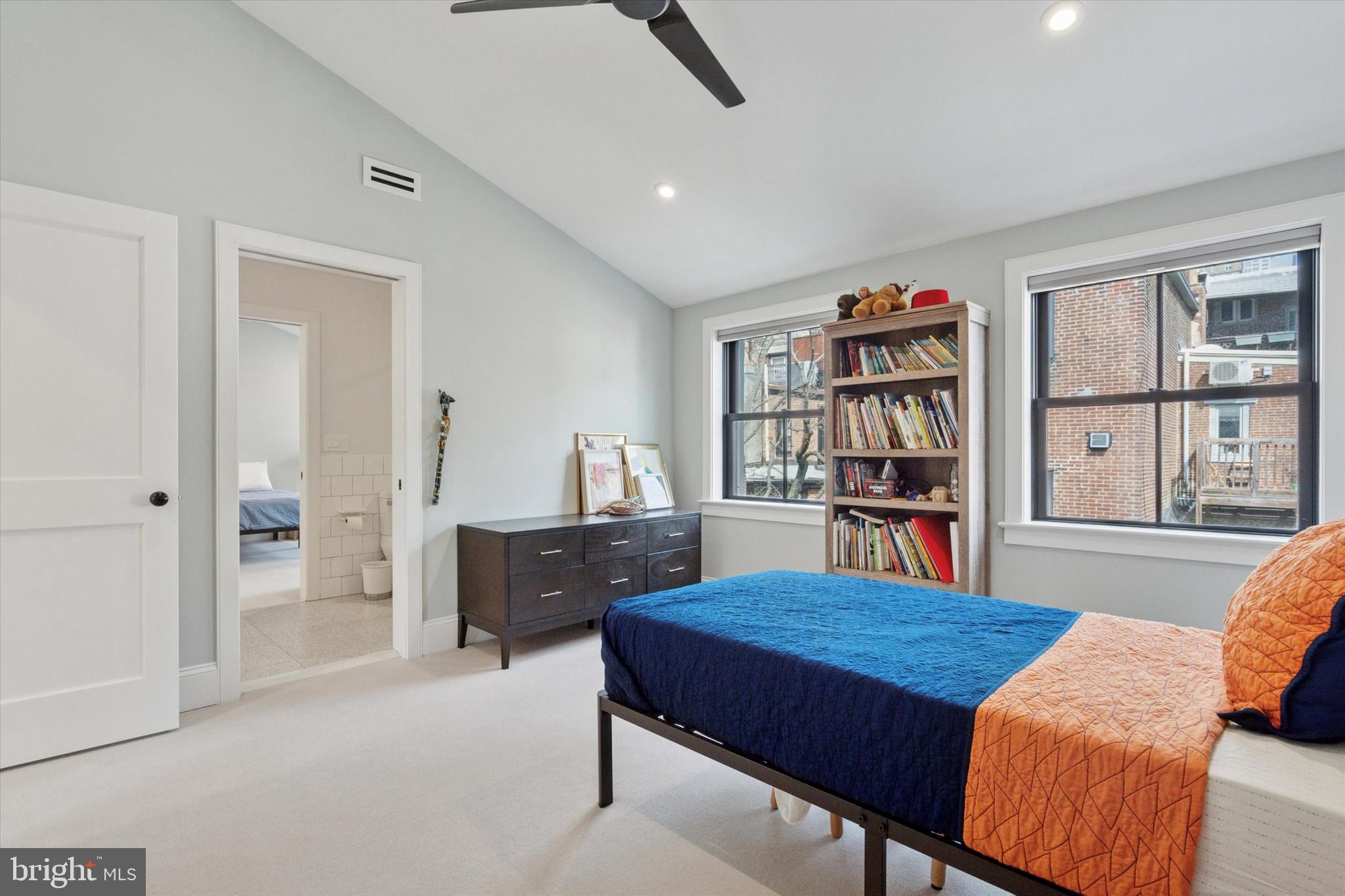 1725-27 Addison Street Philadelphia, PA 19146 - Photo 26 of 43 a view of a livingroom with furniture and window
