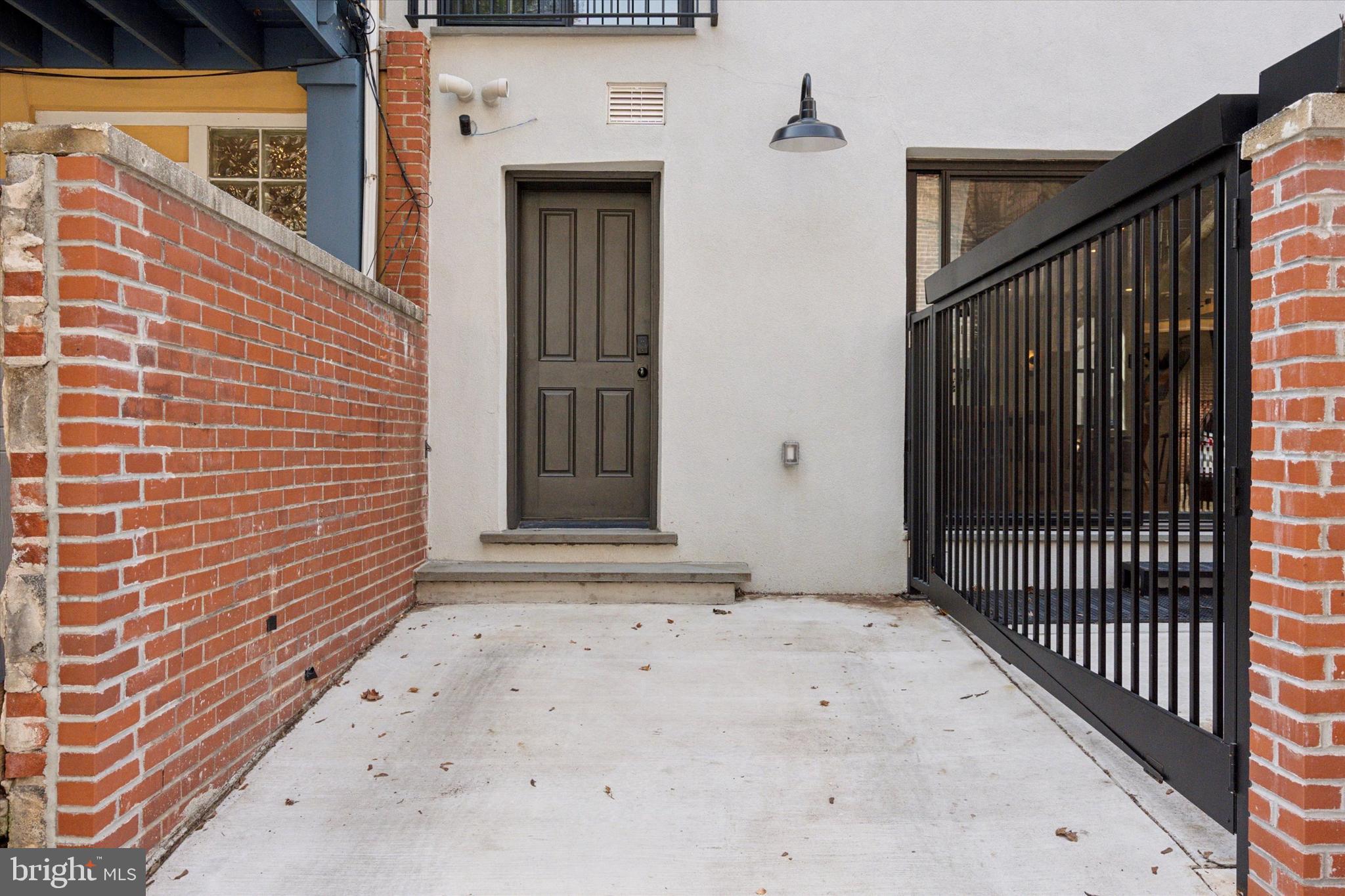 1725-27 Addison Street Philadelphia, PA 19146 - Photo 38 of 43 a view of a door with wooden door