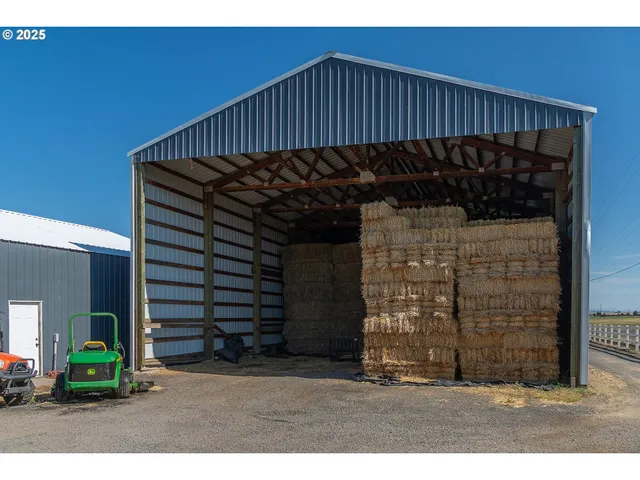 a view of a house with wooden wall and a porch