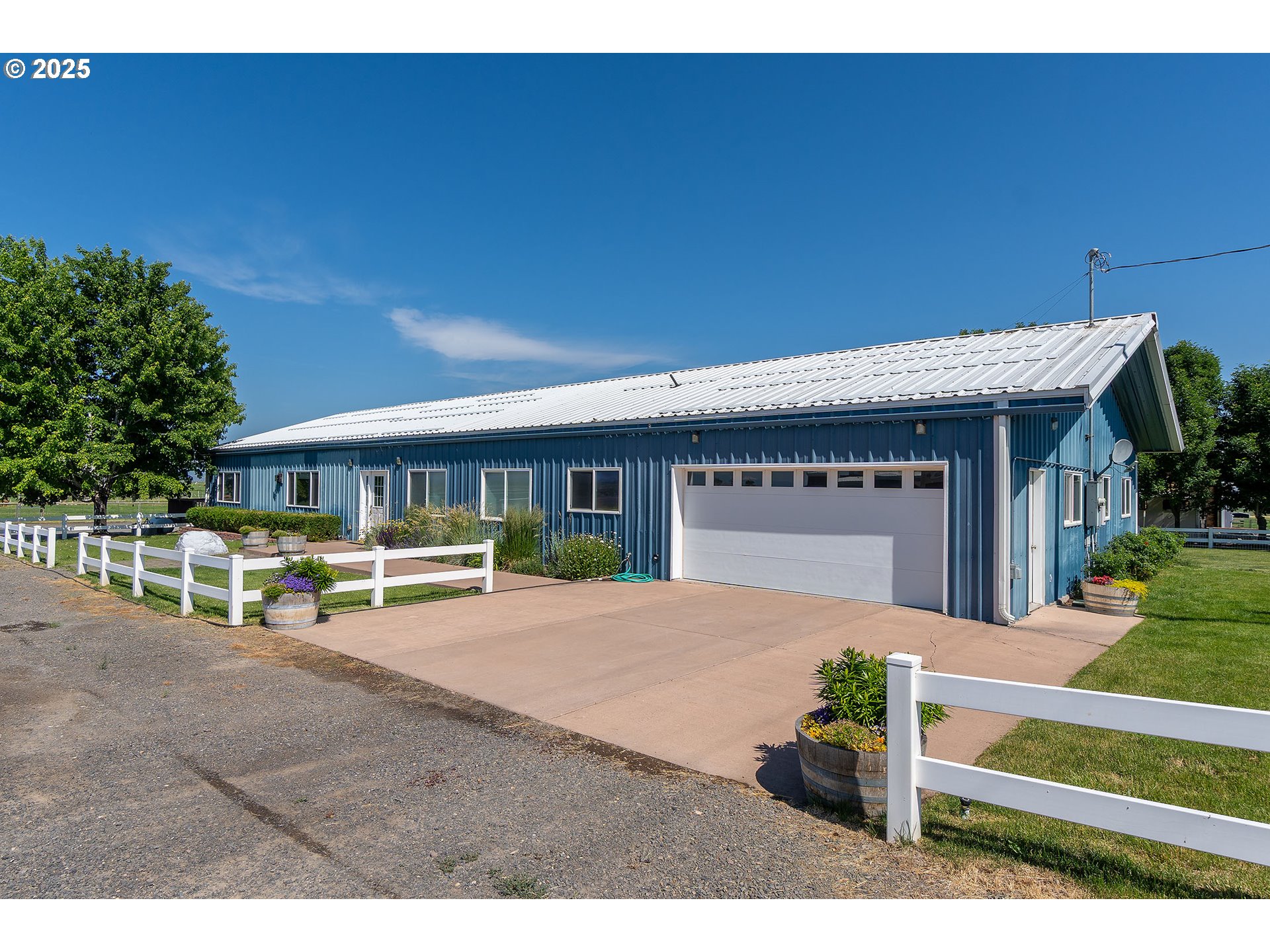 12444 Southwest Green Drive Culver, OR 97734 - Photo 21 of 34 a view of a house with wooden wall and a porch