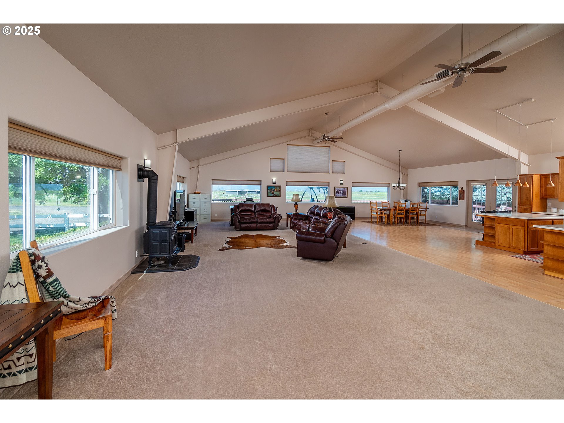 12444 Southwest Green Drive Culver, OR 97734 - Photo 23 of 34 a living room with lots of furniture and a large window