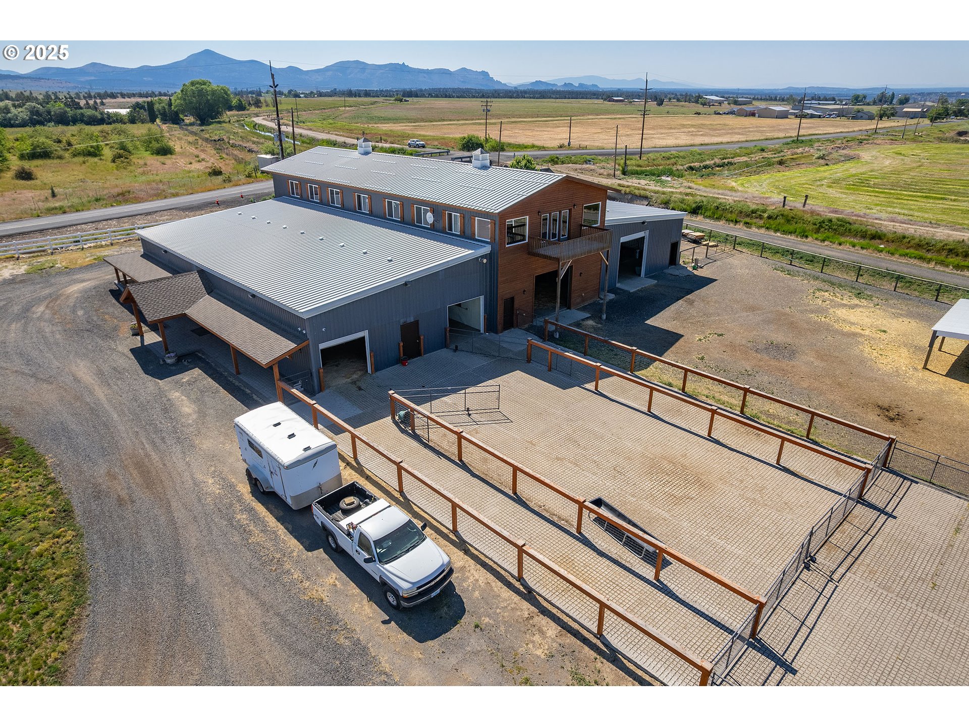 12444 Southwest Green Drive Culver, OR 97734 - Photo 9 of 34 a view of a ocean with a table and chairs