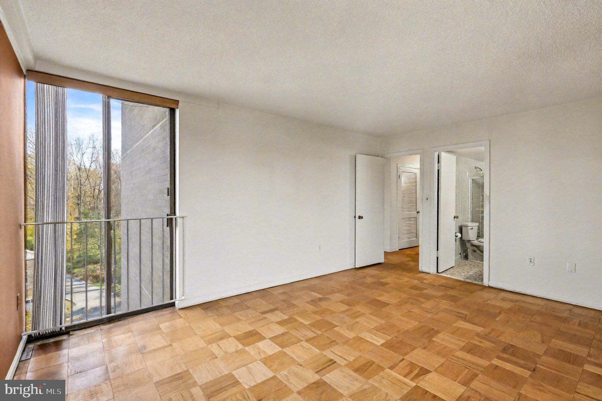 2100 Washington Avenue, Unit 6B Silver Spring, MD 20910 - Photo 20 of 33 a view of an empty room with a window